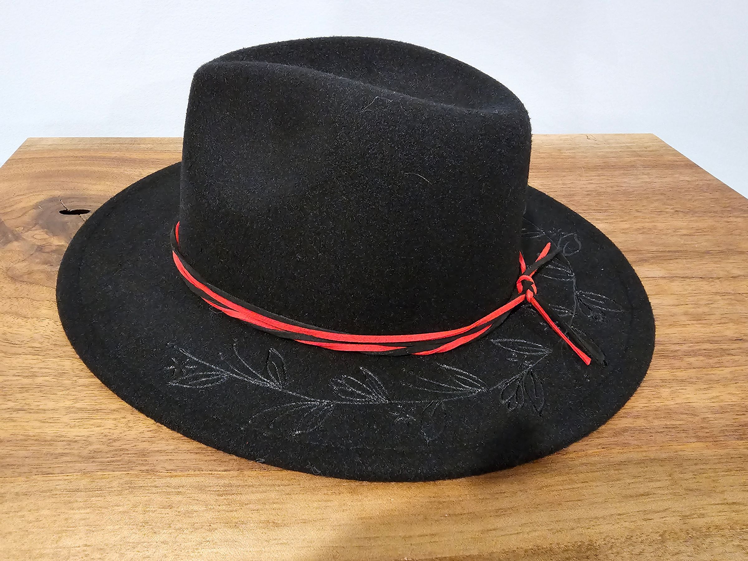 Black Fedora with floral design and red suede band $75
