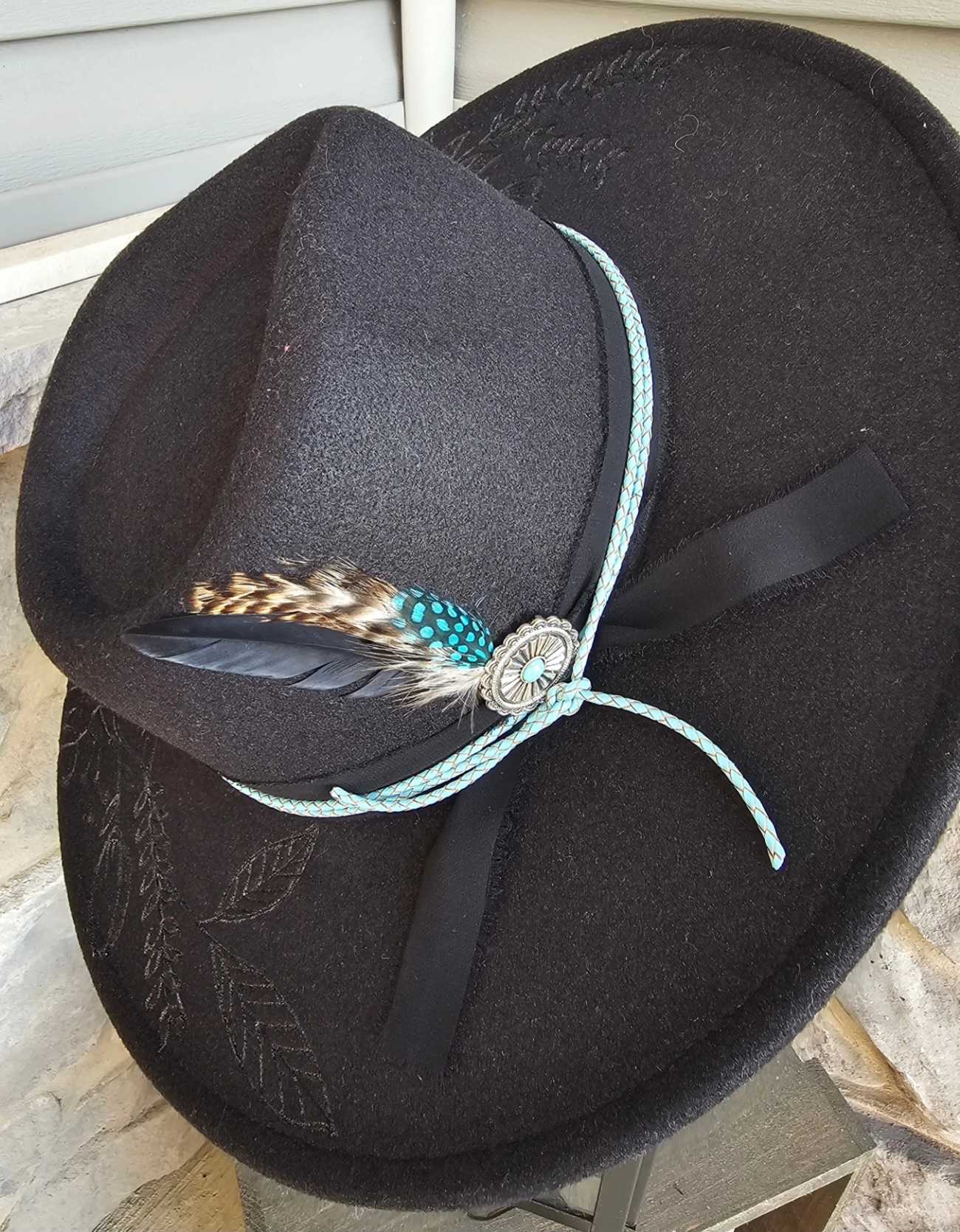 Black Wide Brim Rancher hat with floral design and turquoise accents and band $110