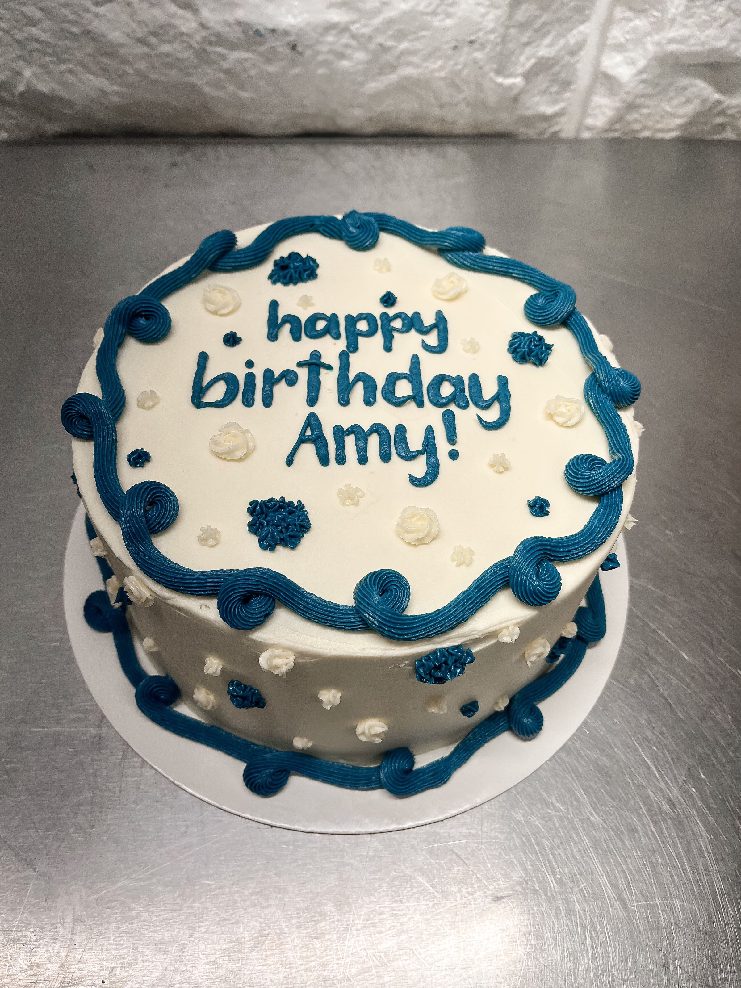 blue and white vanilla bean birthday cake