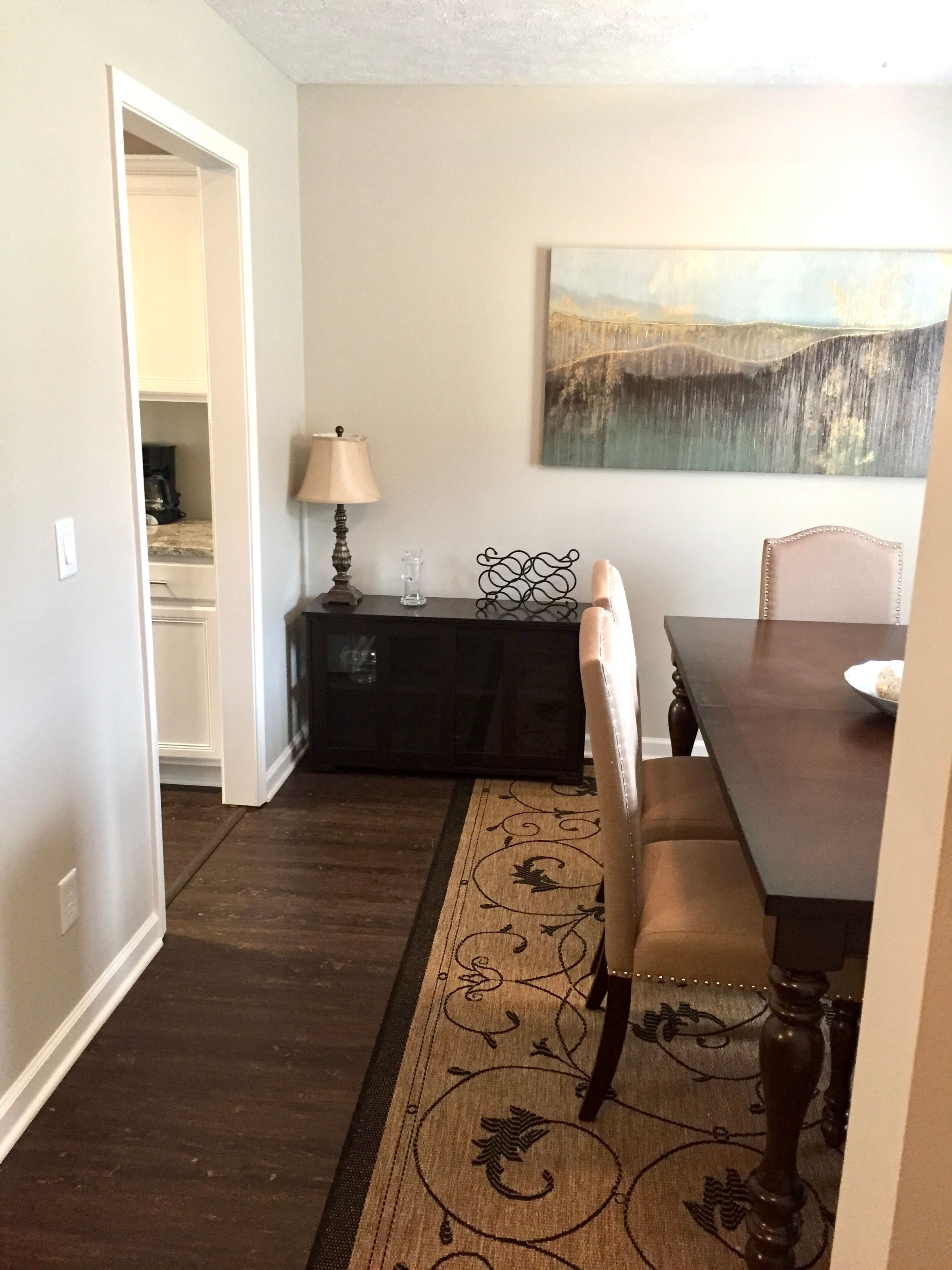 Dining room wine rack, kitchen to the left