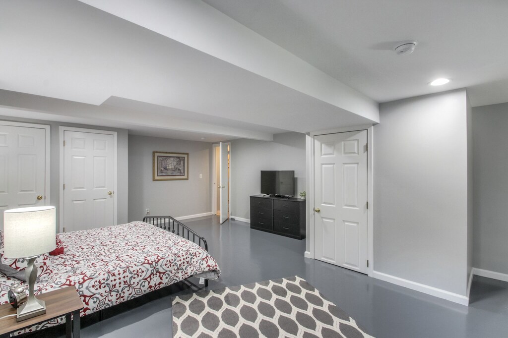 private retreat area in basement has king bed