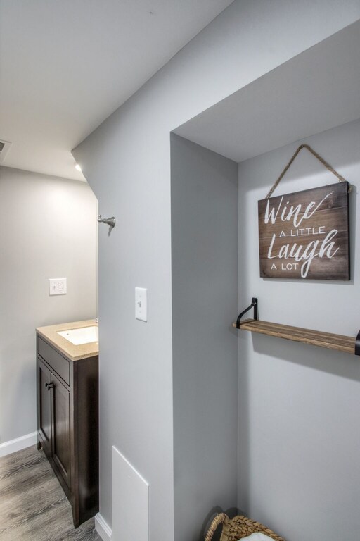 private retreat bath with additional door to garage and bar room entrance