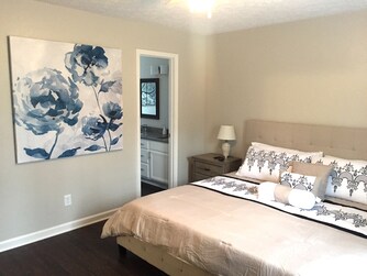 master suite king bedroom with walk-in closet on the left side before the bed