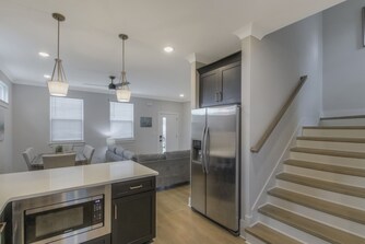 kitchen area leading into living room