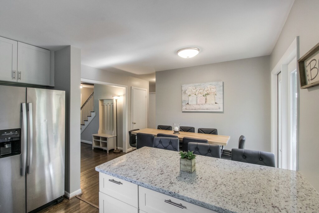 kitchen leads to basement door and main floor bath