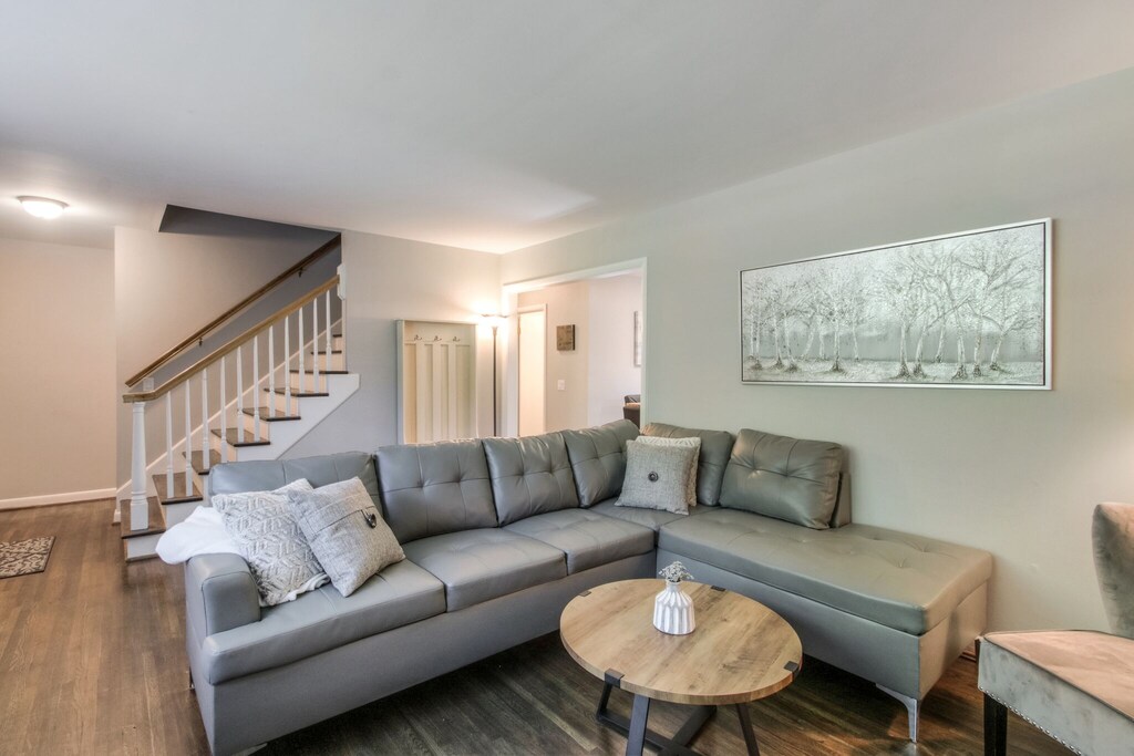 living room couch and chair with plenty of seating