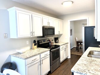 flattop stove/oven, microwave, and regular coffee pot