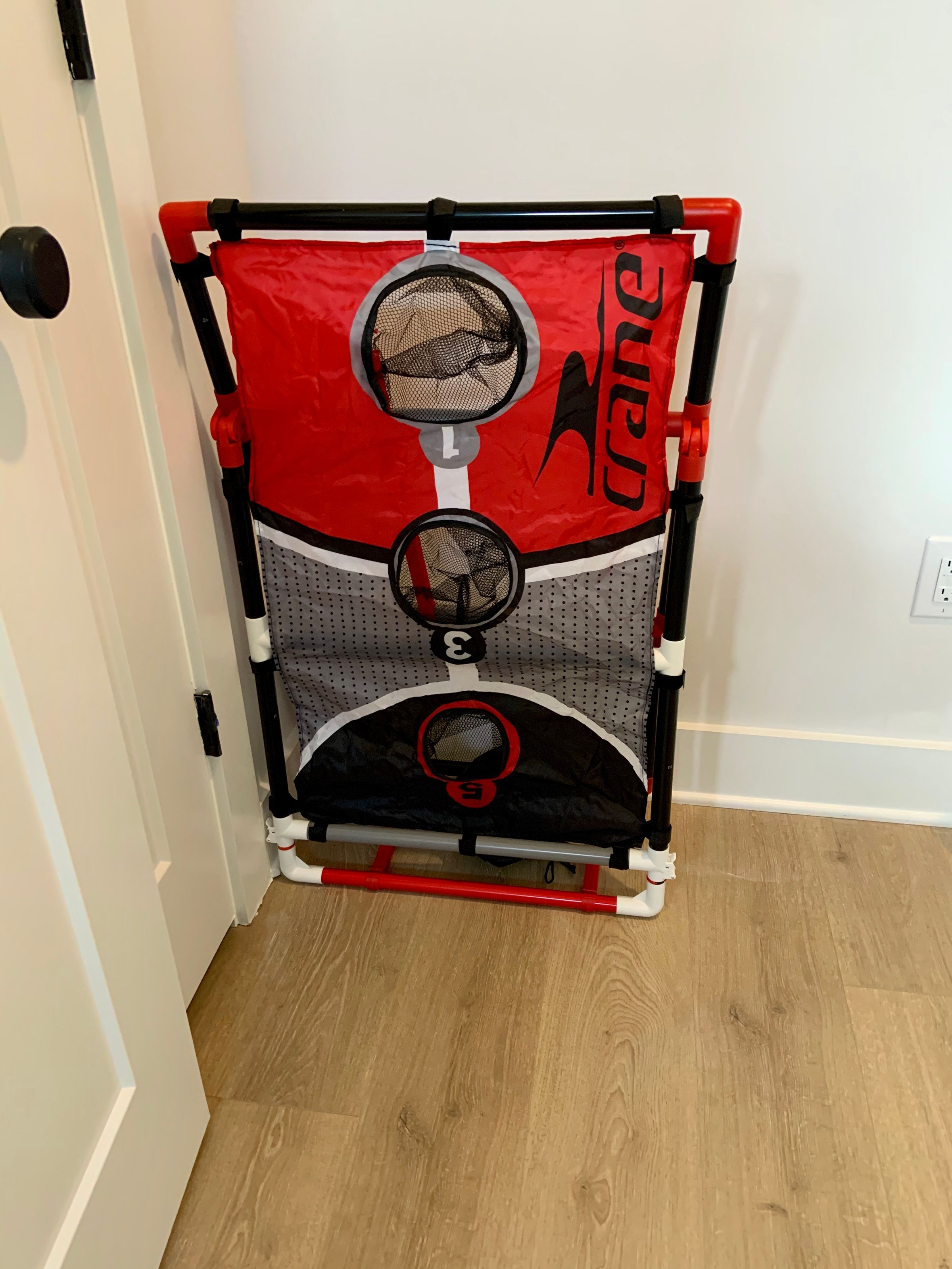 corn hole for backyard area kept in laundry room