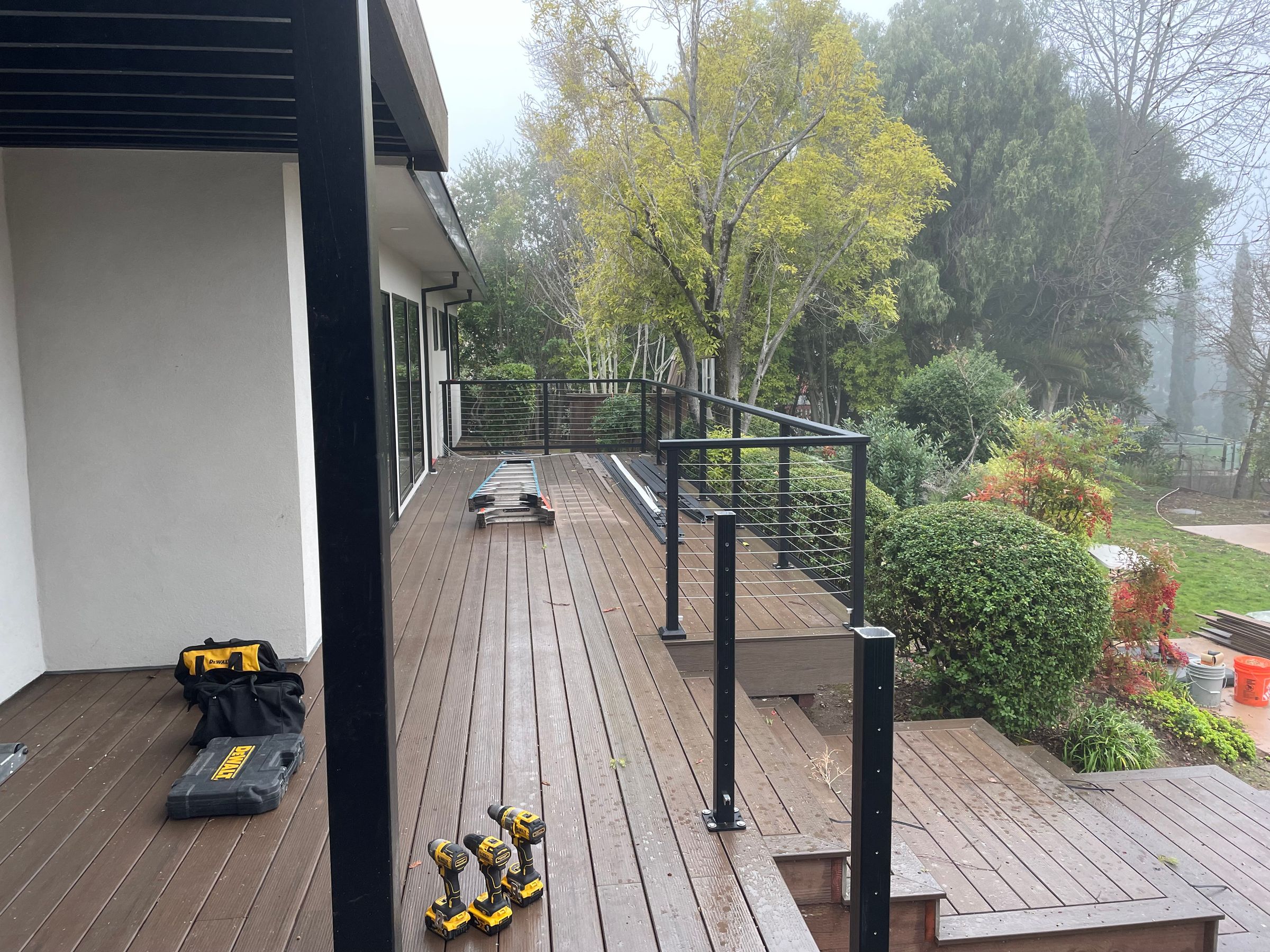 Metal posts with cable railing 