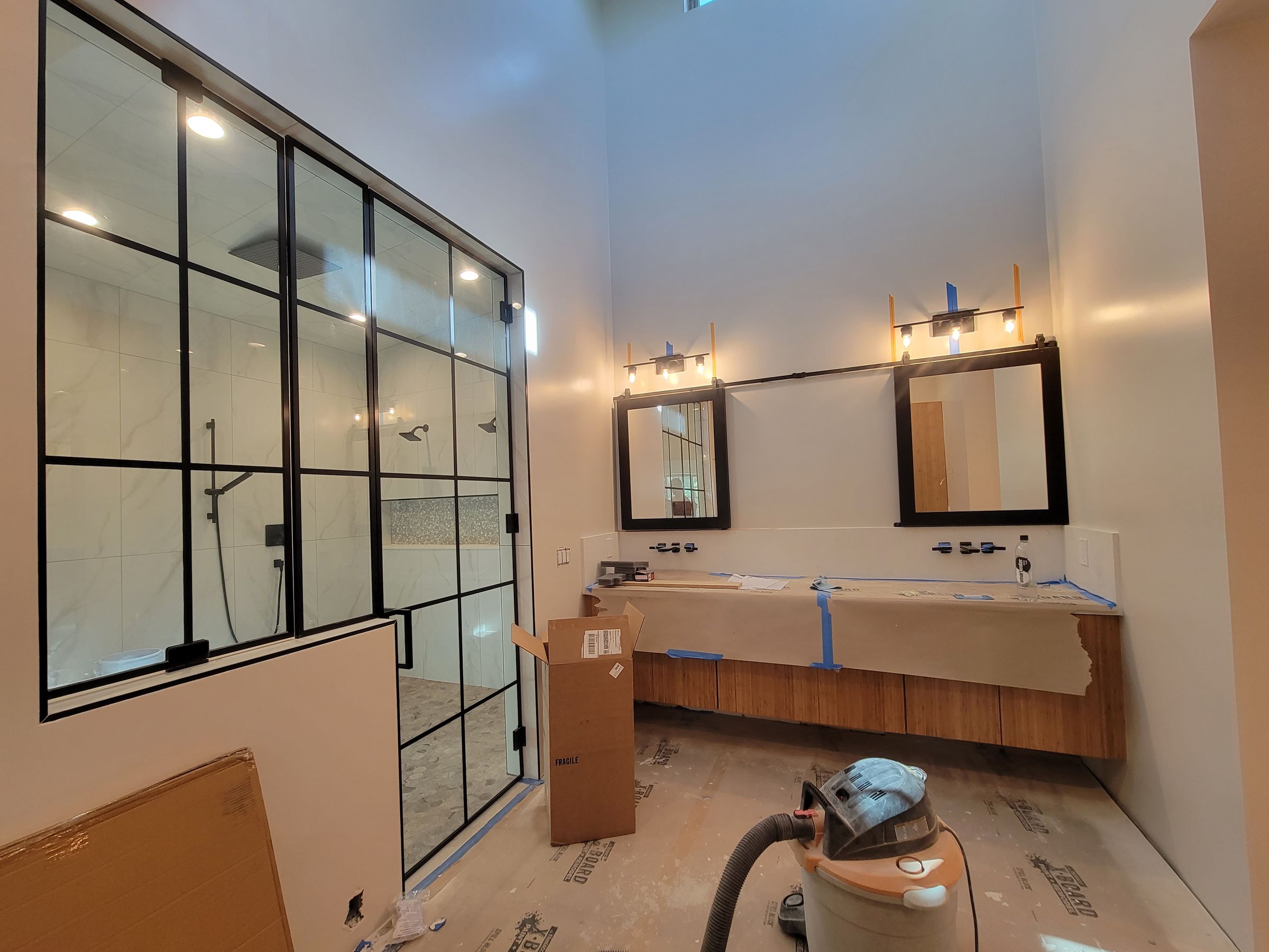 Bathroom lighting fixtures installed.