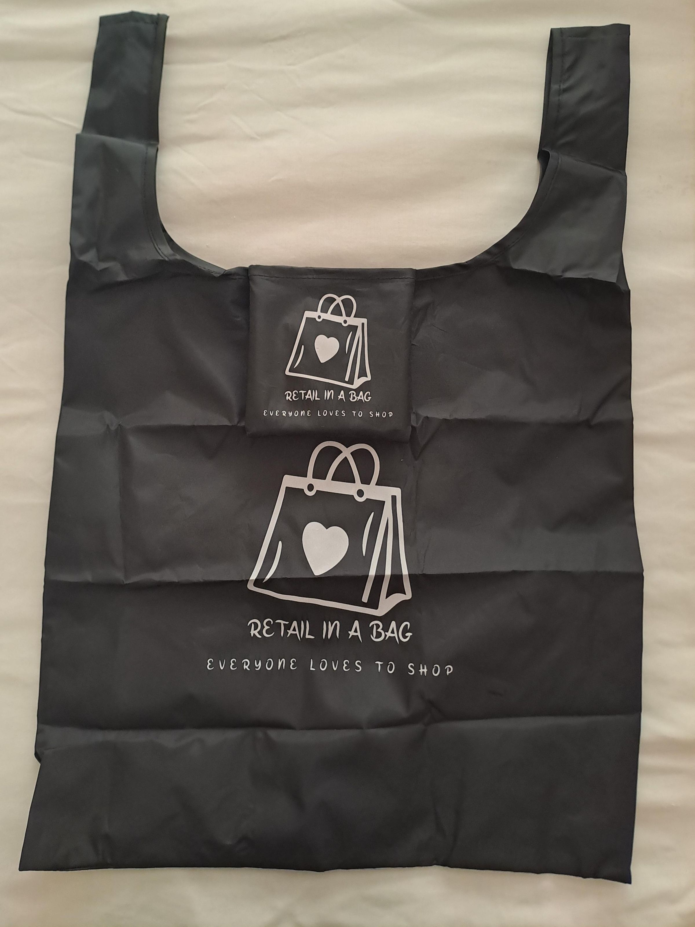  Bag: Size:38cmx 8cm x 52cm Pocket: Size: 12cm*12cm On the bag logo:16cm*16cm On the pocket logo:8.5cm*8.5cm