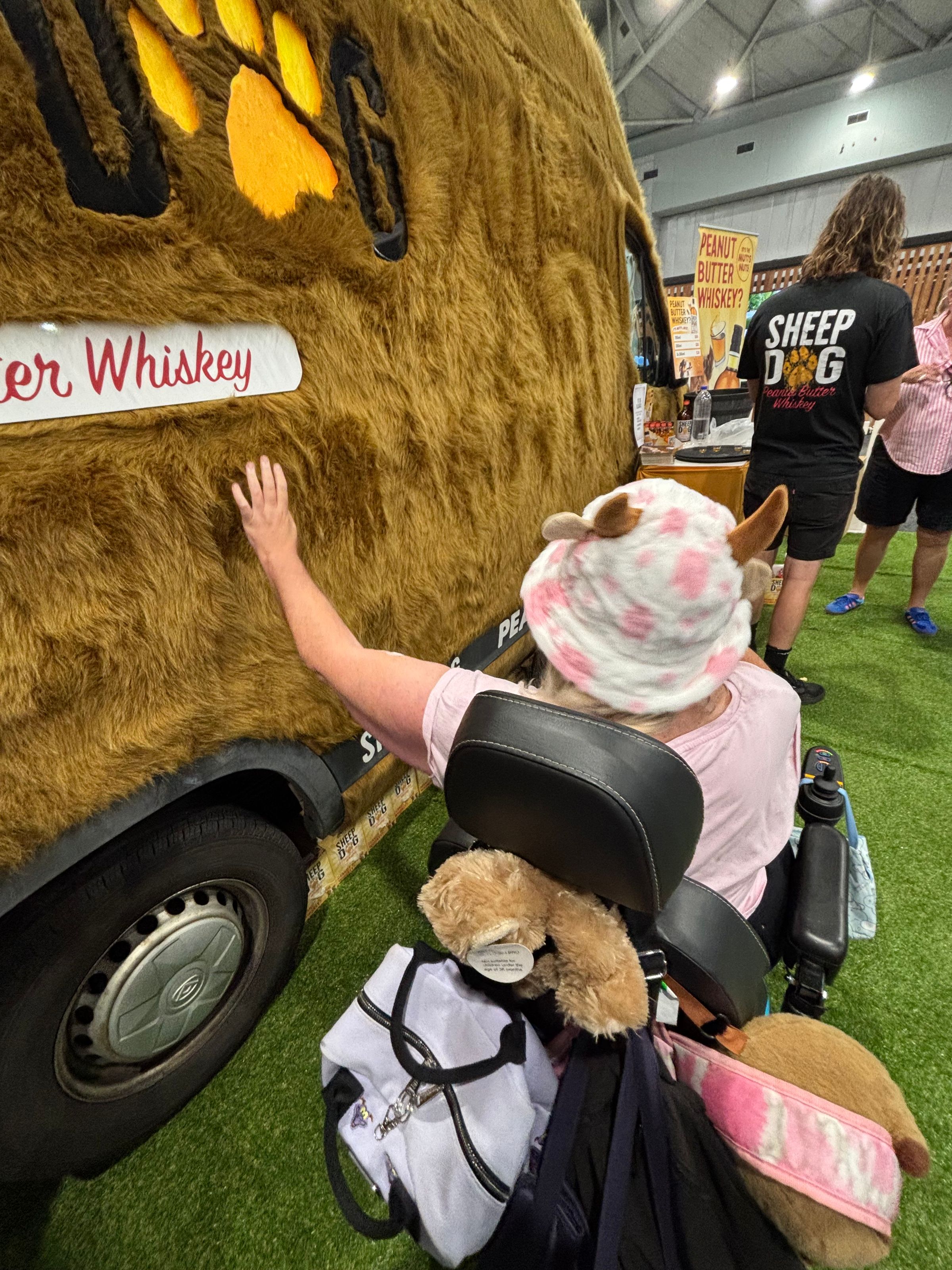 patting the furry car - Sheep dog whiskey 
