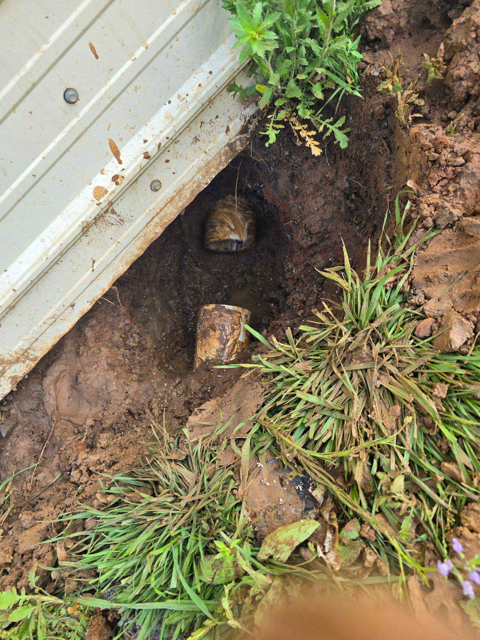 Excavation and removal of the damaged pipe section. Identifying the problem and preparing for a proper, long-lasting repair.