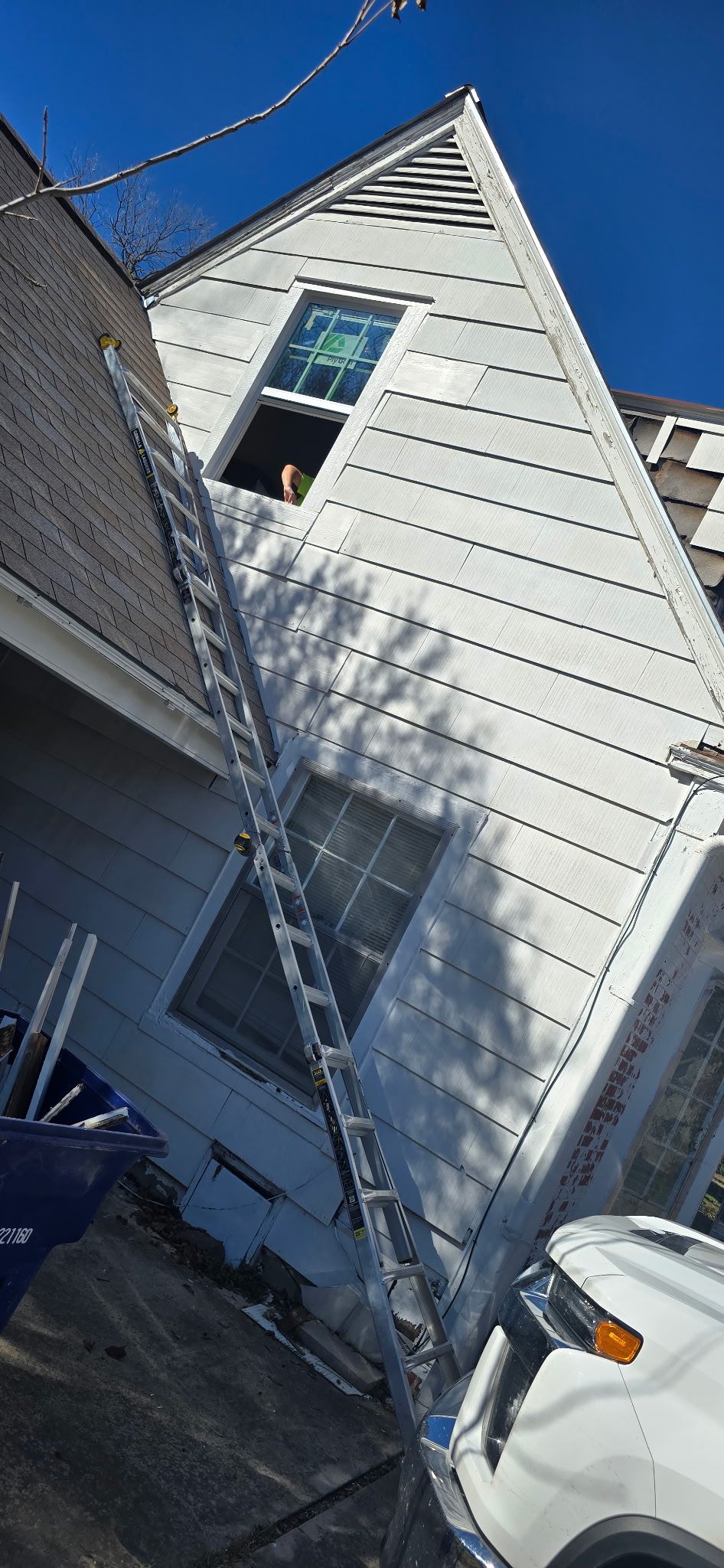 Repaired siding and installed new window