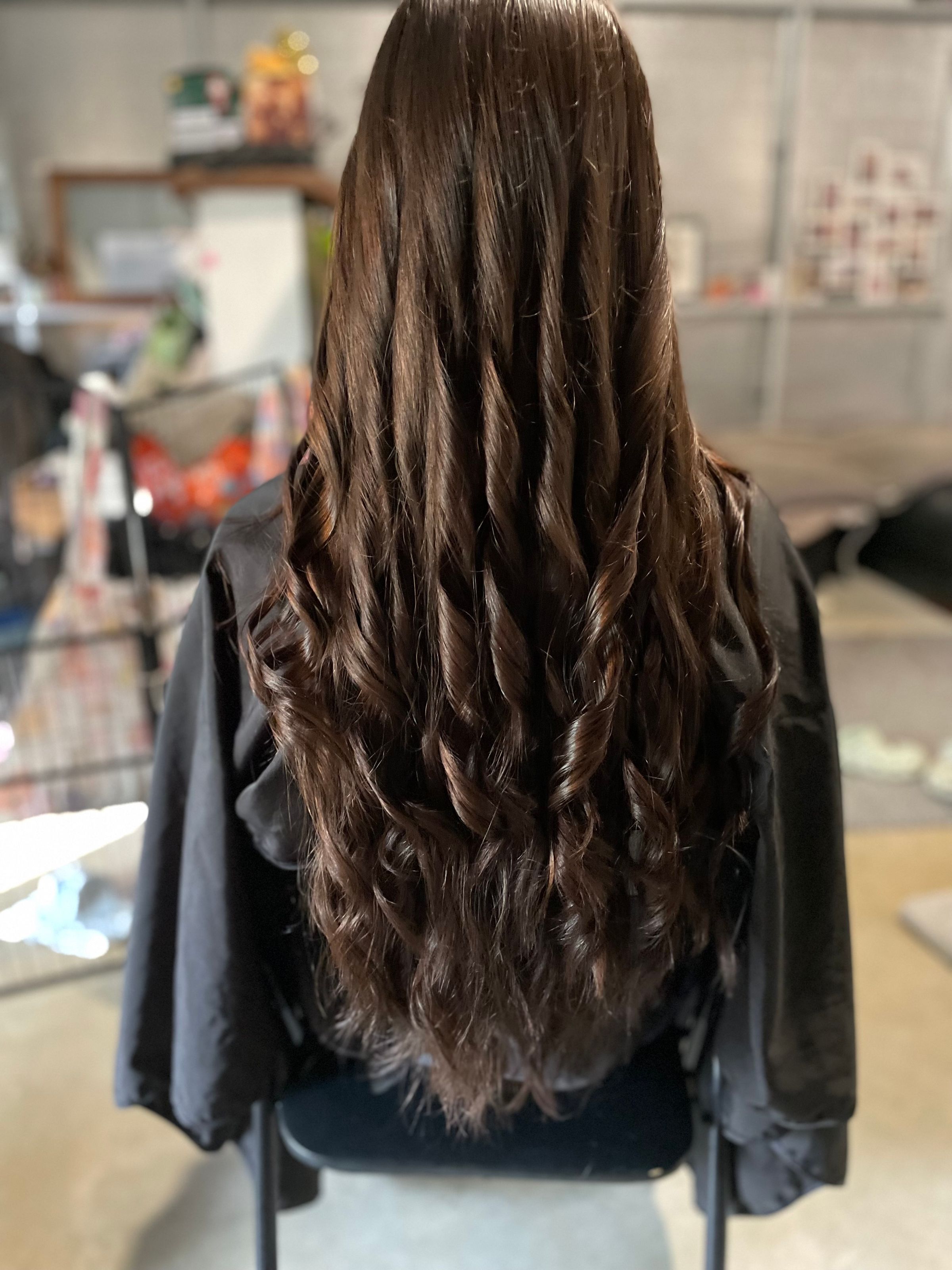 long brown curly hair, bouncy blow dry, Hervey Bay mobile hairdresser
