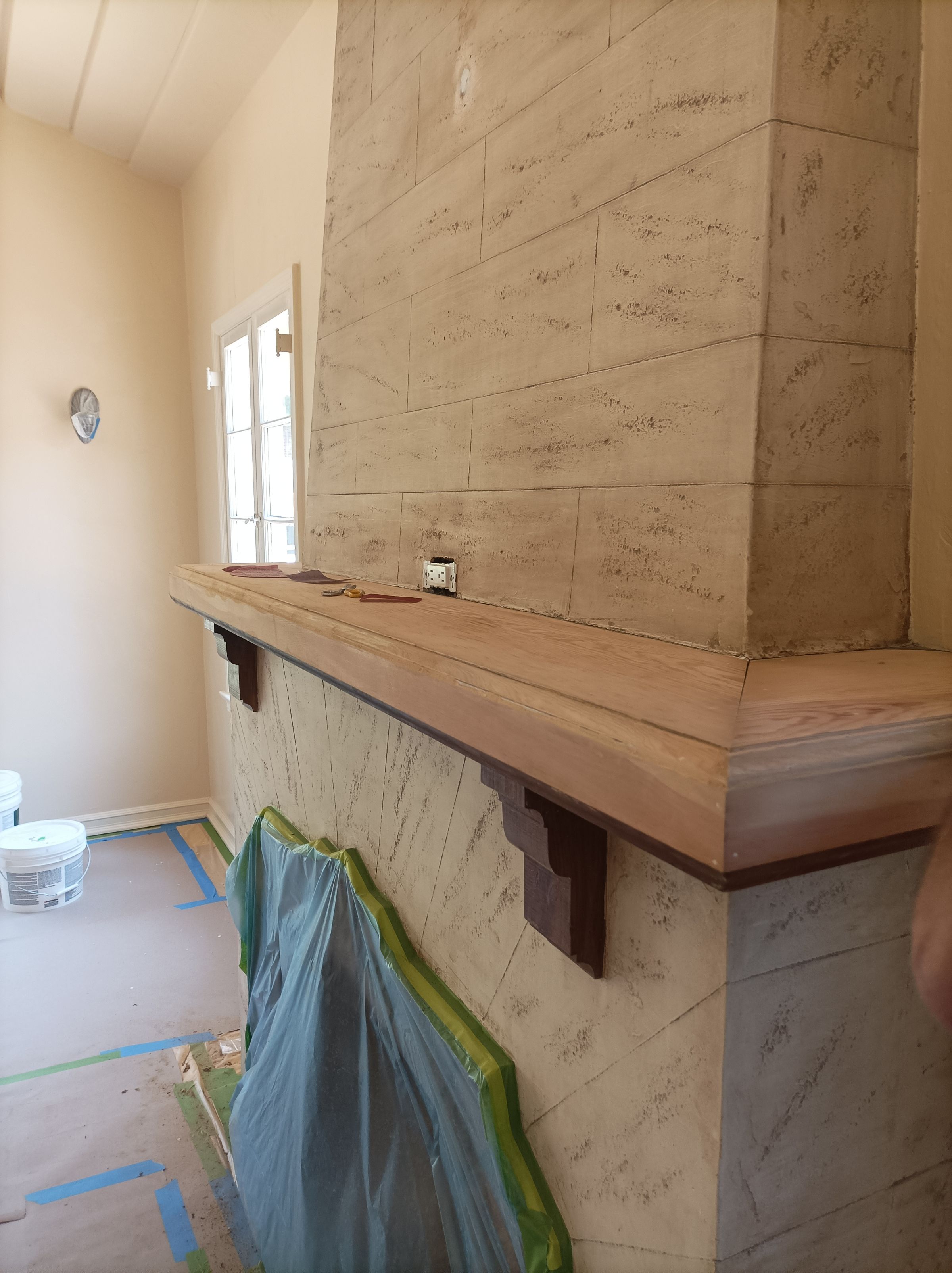 Fireplace repaint and wall restoration – Glendale home interior