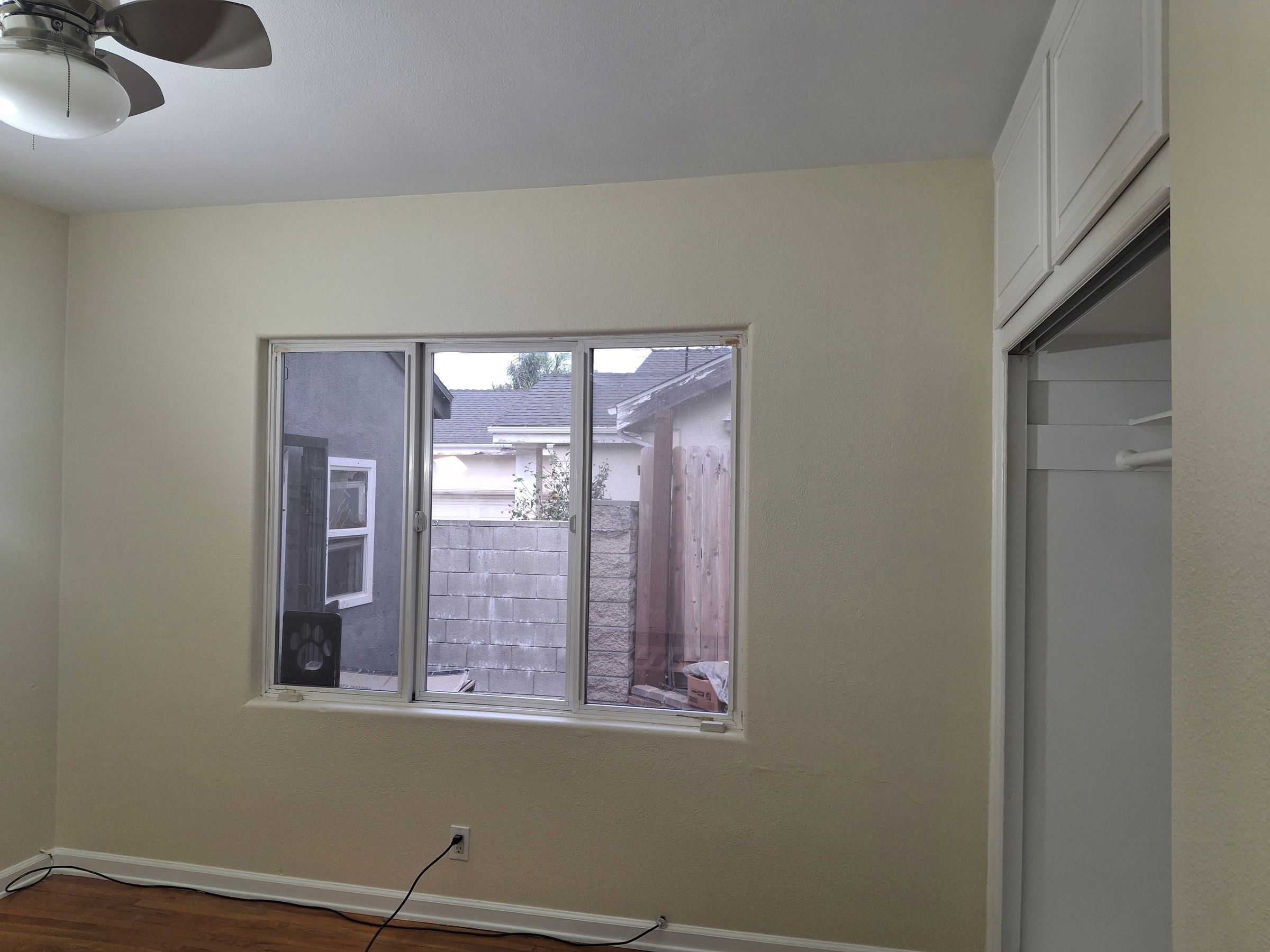 Wall refinishing and window trim repaint – Los Angeles County home