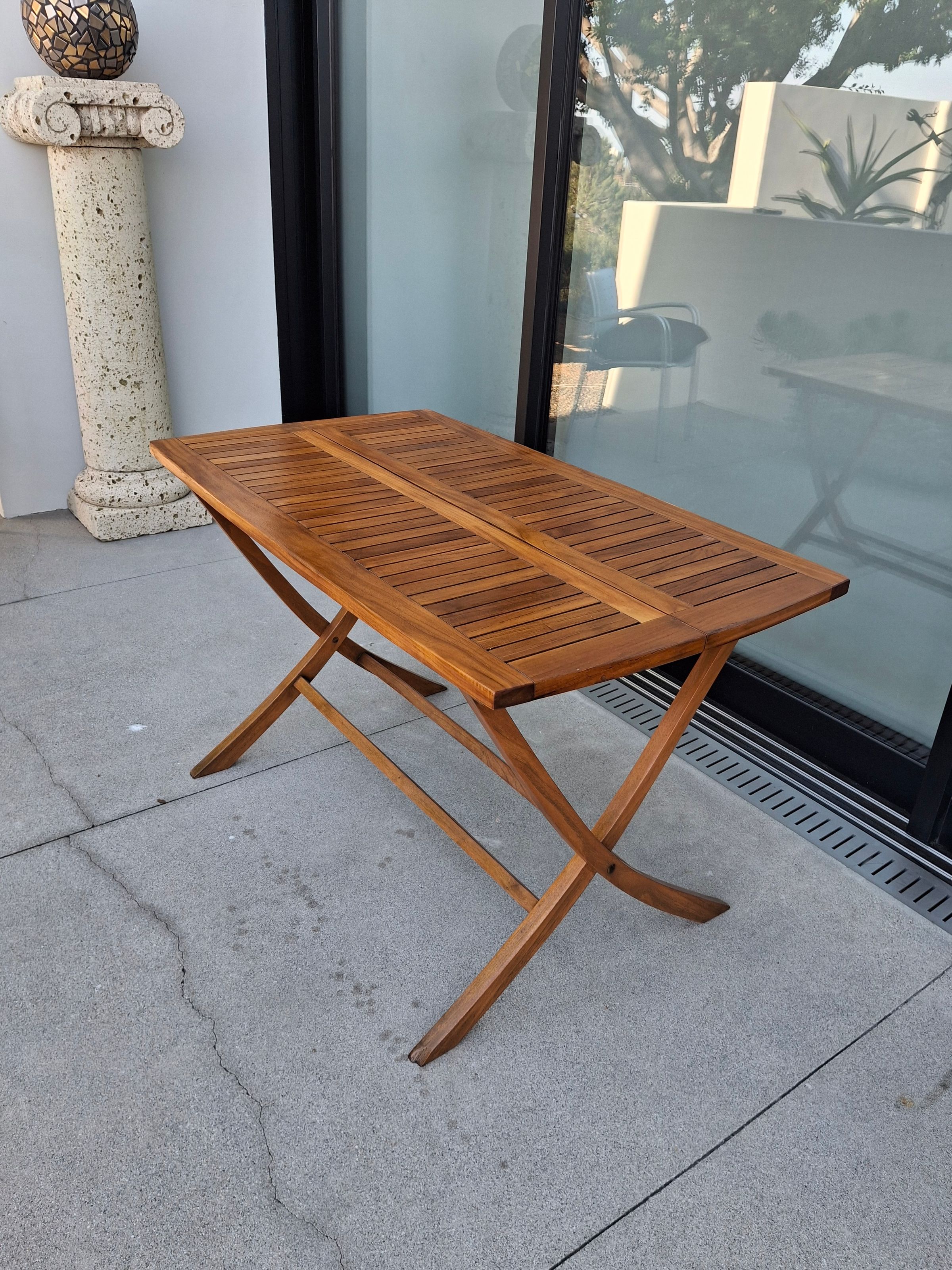 Outdoor wood table – restored and sealed for weather protection