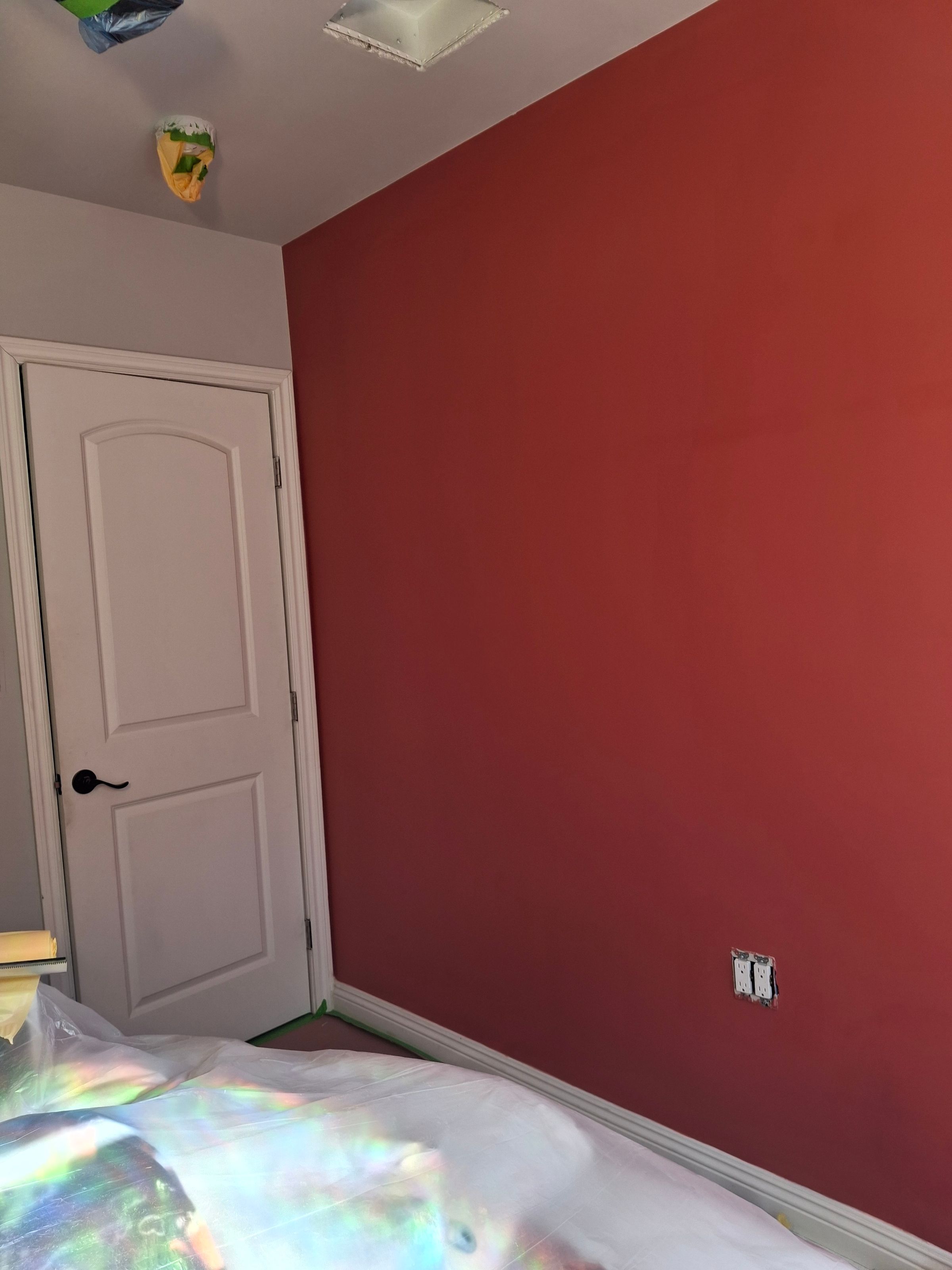 Bold color makeover – red accent wall interior painting project