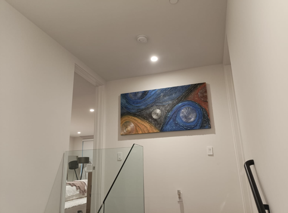 Modern wall art installation – abstract painting in interior space