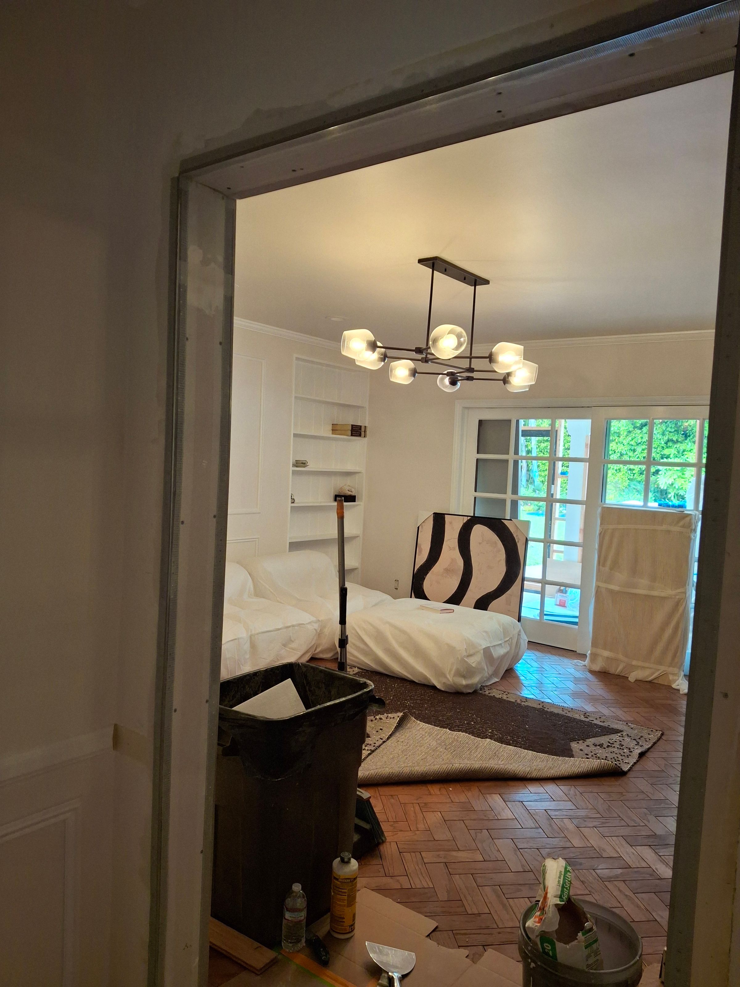 Home renovation progress – wall refinishing and trim preparation