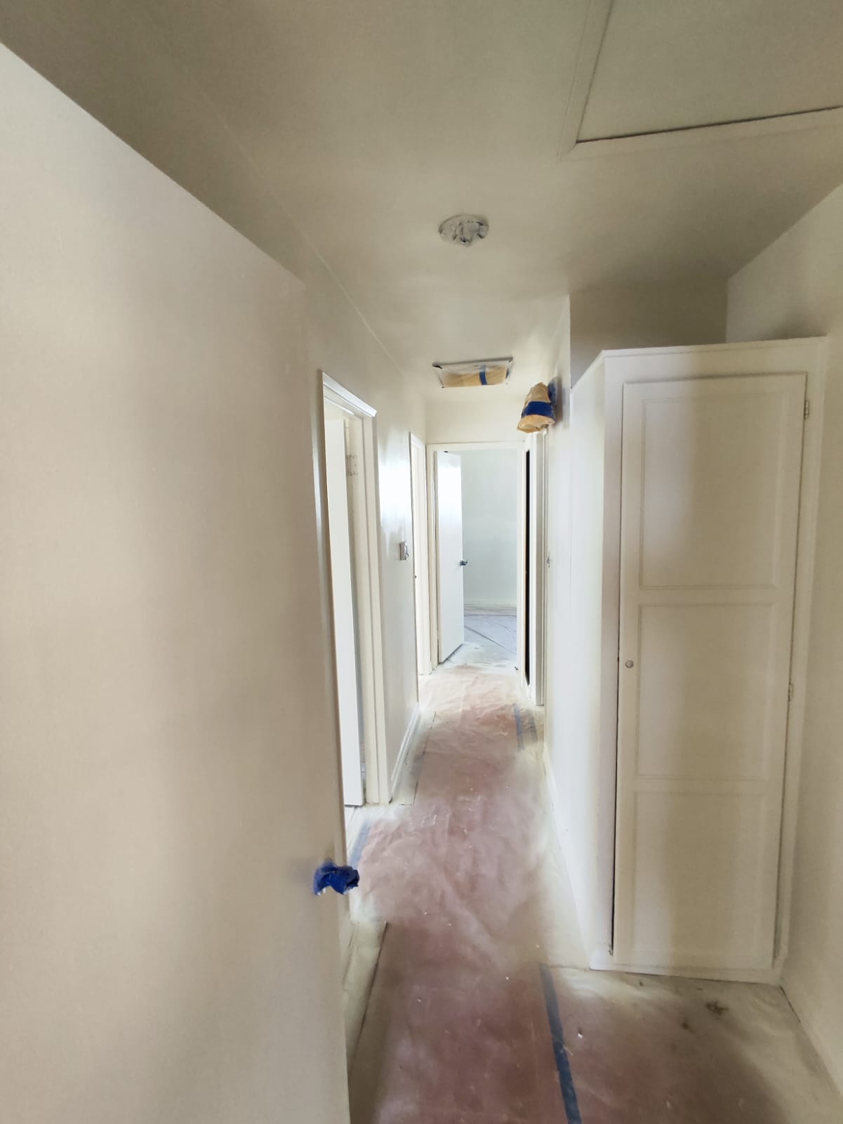 In process– interior painting prep, hallway, Los Angeles CA