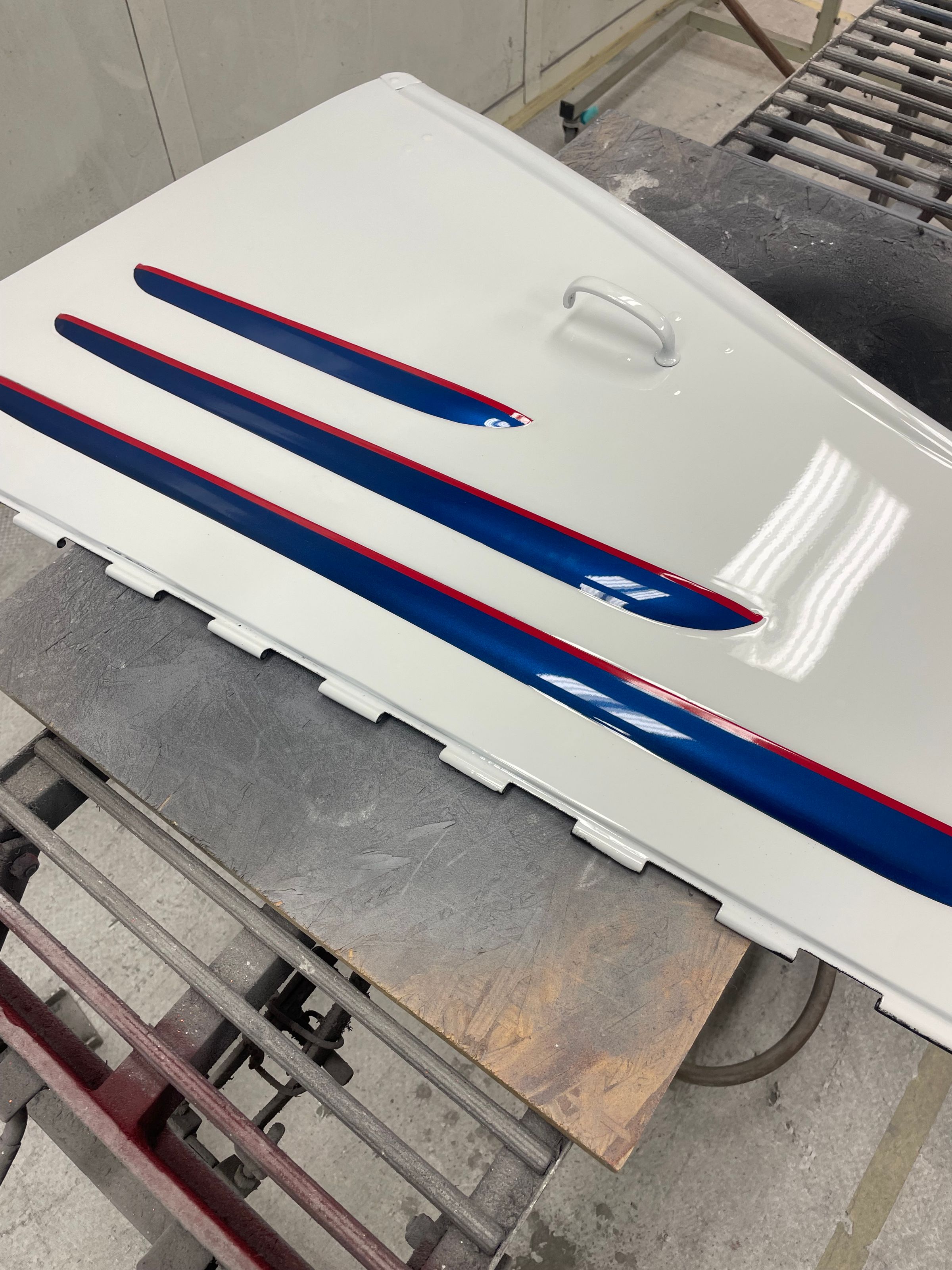Engine Doors painted by Barrett collision repair & refinishing 