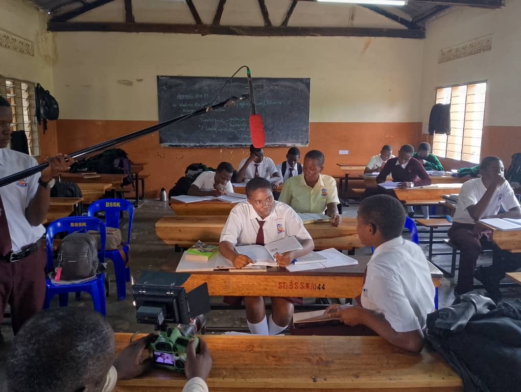 Behind the scenes photo during the filming of " Ray of Light", a skit on Mental Health. It was acted, June, 2025 by students of St. Balikuddembe Secondary School, Kisoga, Mukono District.