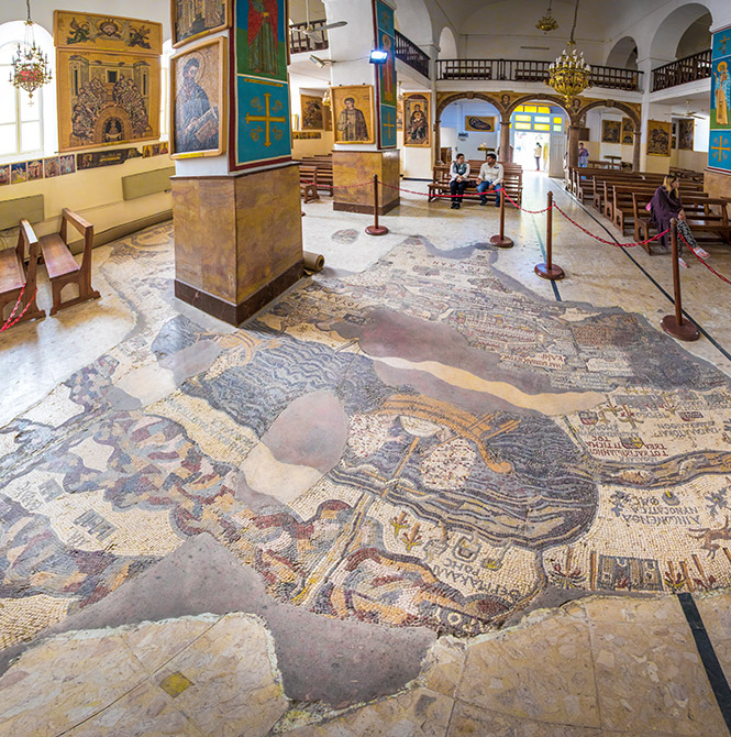 Madaba, known as the “City of Mosaics,” is a charming town that weaves together history, spirituality, and artistry. Famous for its Byzantine and Umayyad mosaics, Madaba is home to the world-renowned 6th-century mosaic map of the Holy Land, preserved in the Greek Orthodox Church of St. George. Beyond this masterpiece, the city is dotted with ancient churches, archaeological parks, and vibrant streets that reflect its rich cultural heritage. Madaba has long been a crossroads of faith and history, offering travelers a deep connection to Jordan’s Christian traditions while embracing the warmth of local hospitality. Surrounded by rolling hills and close to Mount Nebo — the biblical site where Moses is said to have viewed the Promised Land — Madaba offers both spiritual significance and timeless beauty. With its blend of sacred history, exquisite artistry, and welcoming atmosphere, Madaba is a living museum that invites visitors to walk through centuries of faith and creativity.