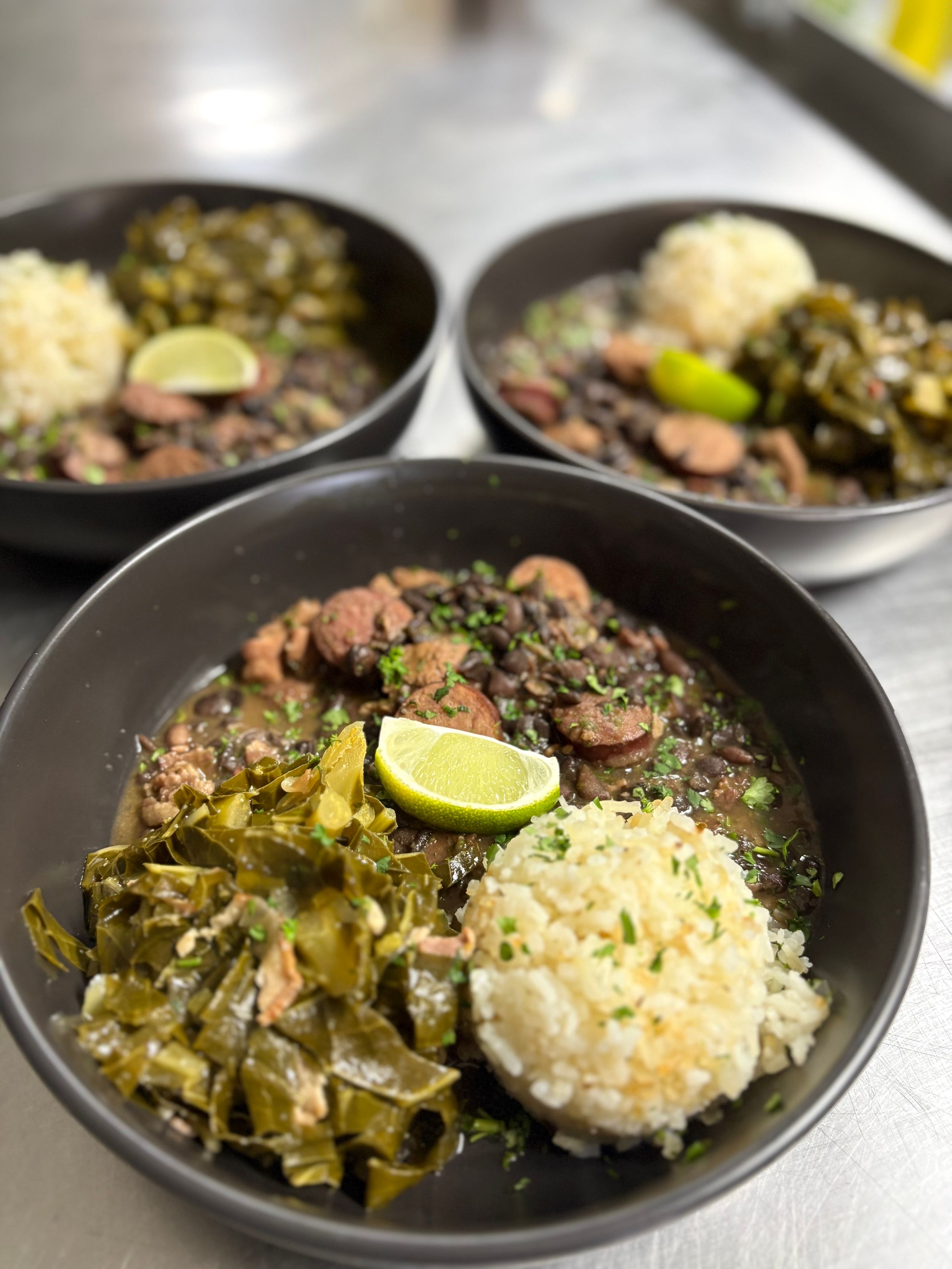 Feijoada (Jasmine Rice, Black Beans, Collard Greens, Bold Brazilian Spices, Sausage and Bacon)