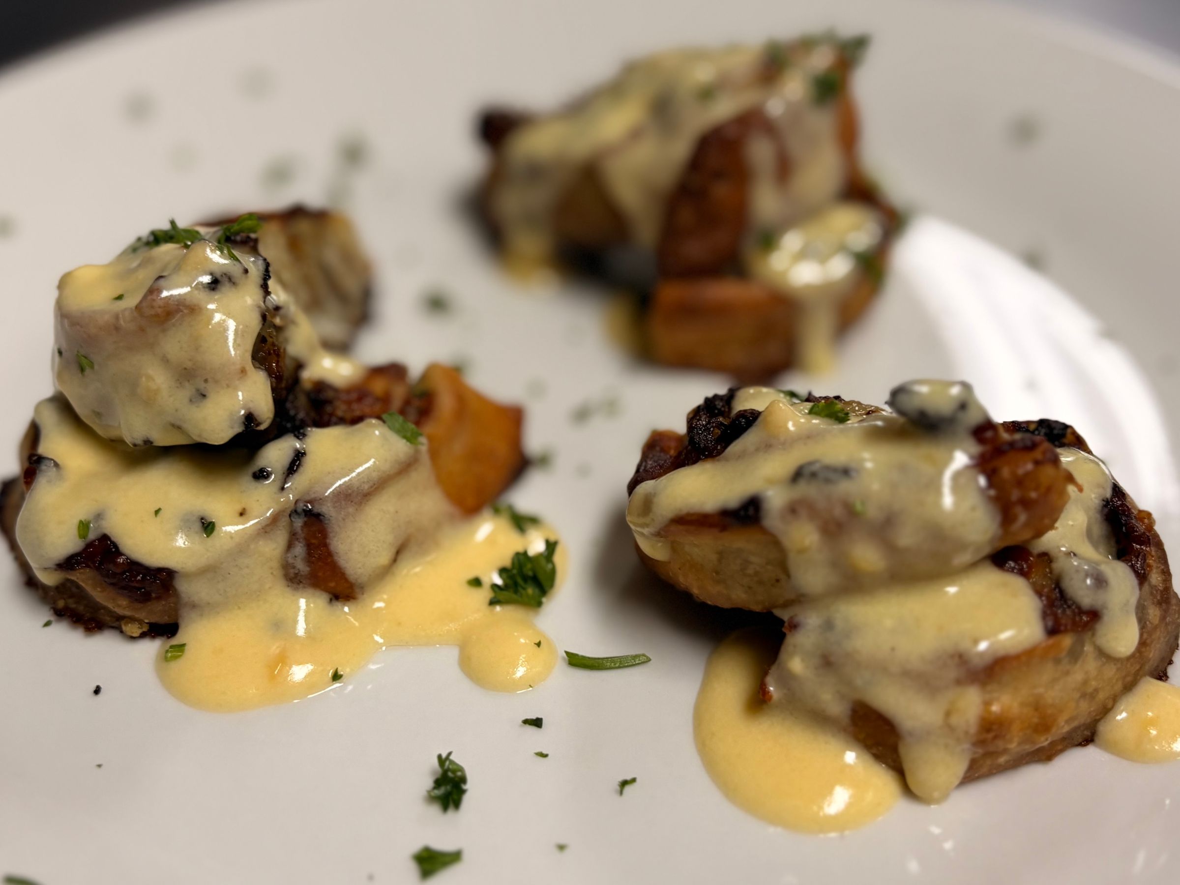 Philly Cheesesteak Pinwheel with House Made Cheese Sauce