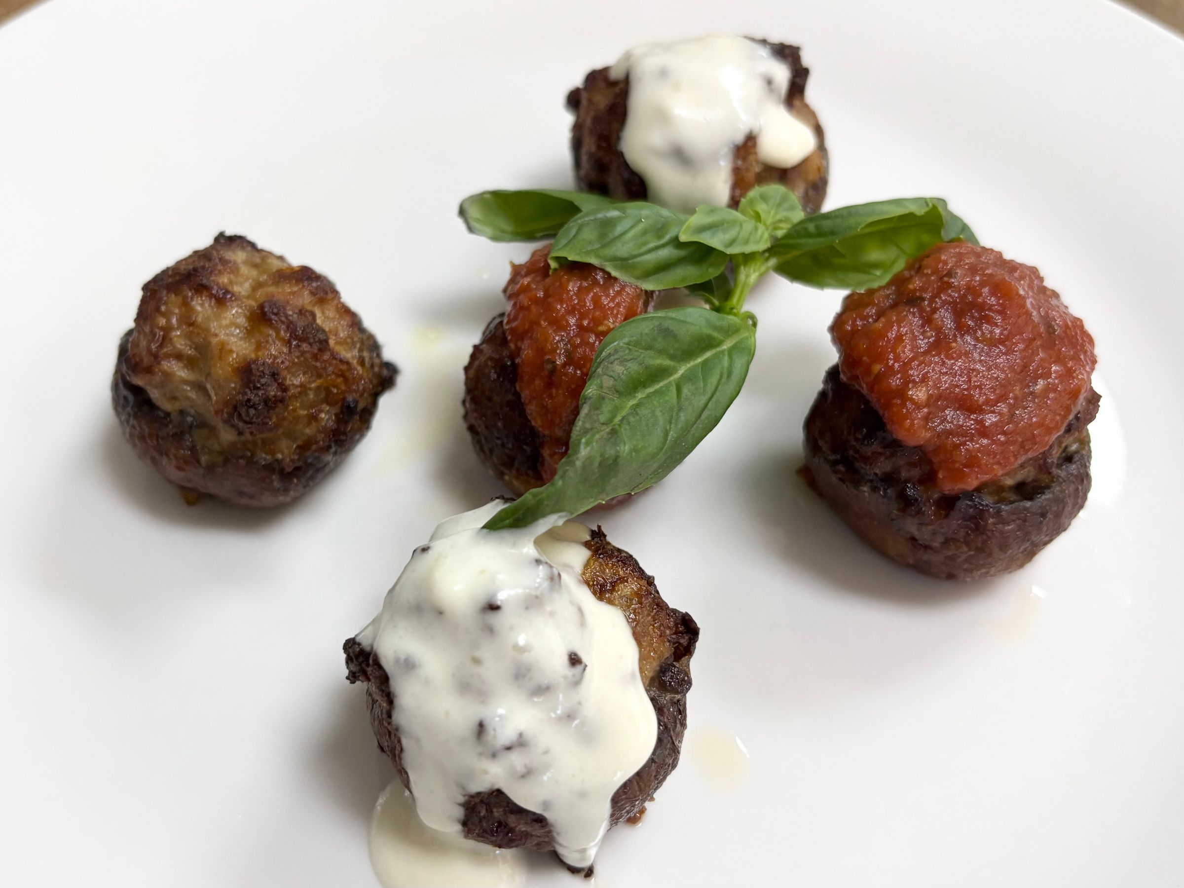 House Made Stuffed Mushrooms, Pesto Cream and House Made Marinara