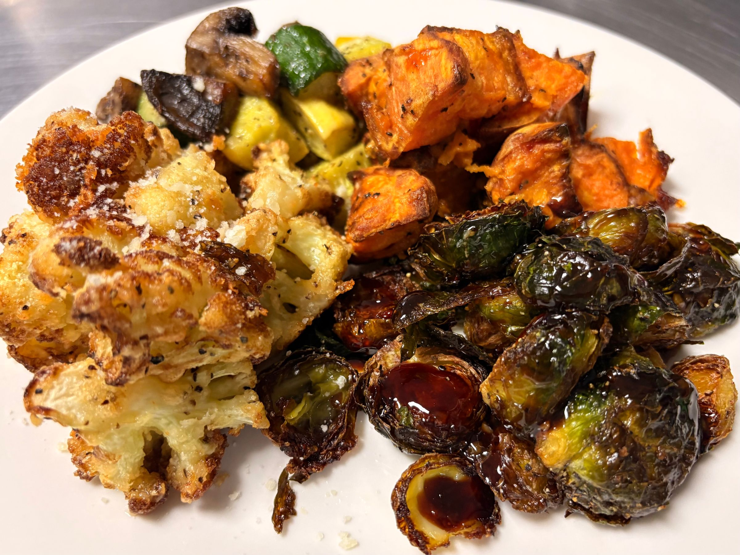 Chili Balsamic Brussels, Roasted Sweet Potatoes, Zucchini, Squash, Mushroom Medley, and Parmesan Cauliflower