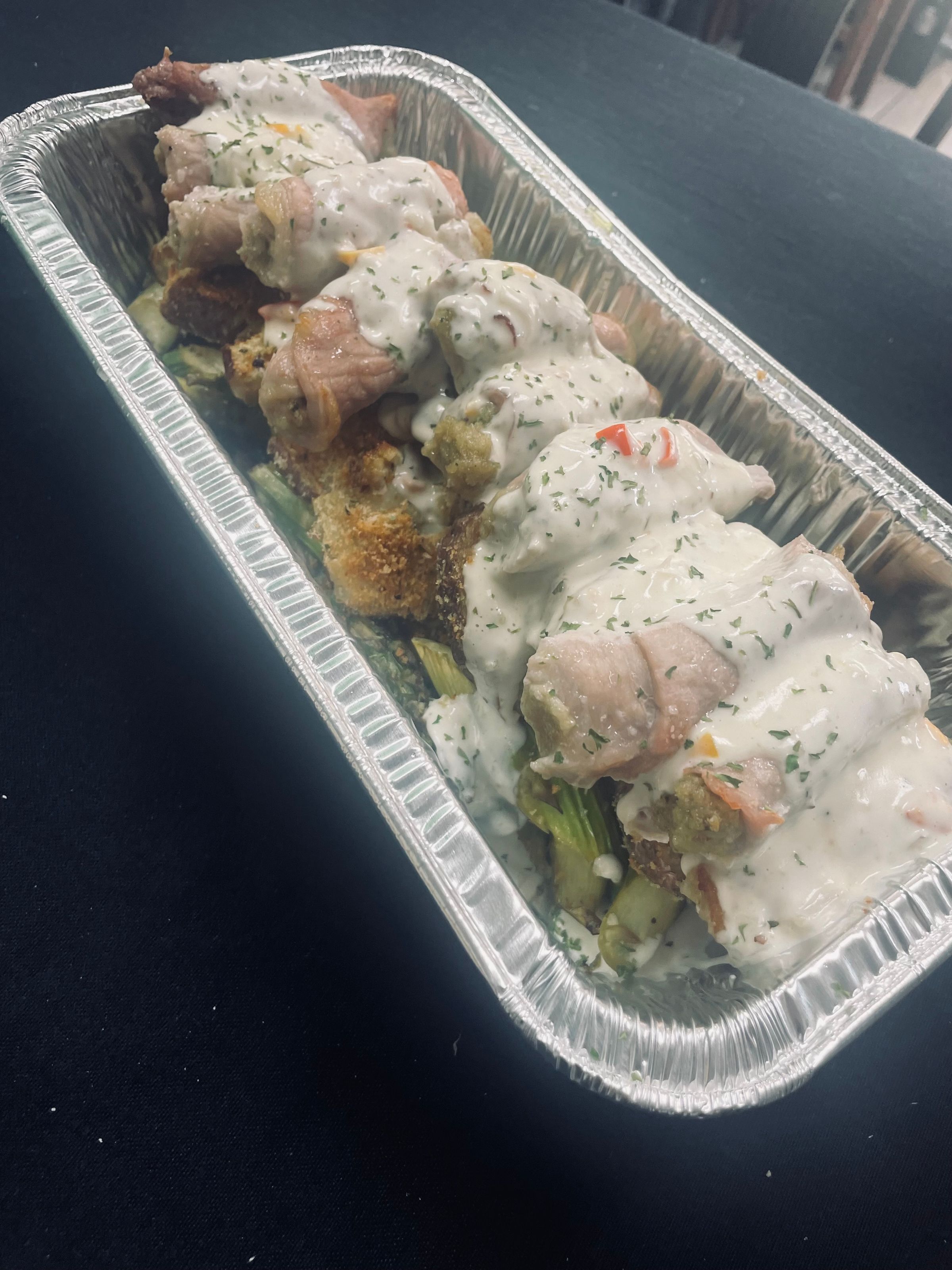 Pork Rotolini with Creamy White Wine Parmesan Sauce, Italian Crispy Potato Cakes and Asparagus
