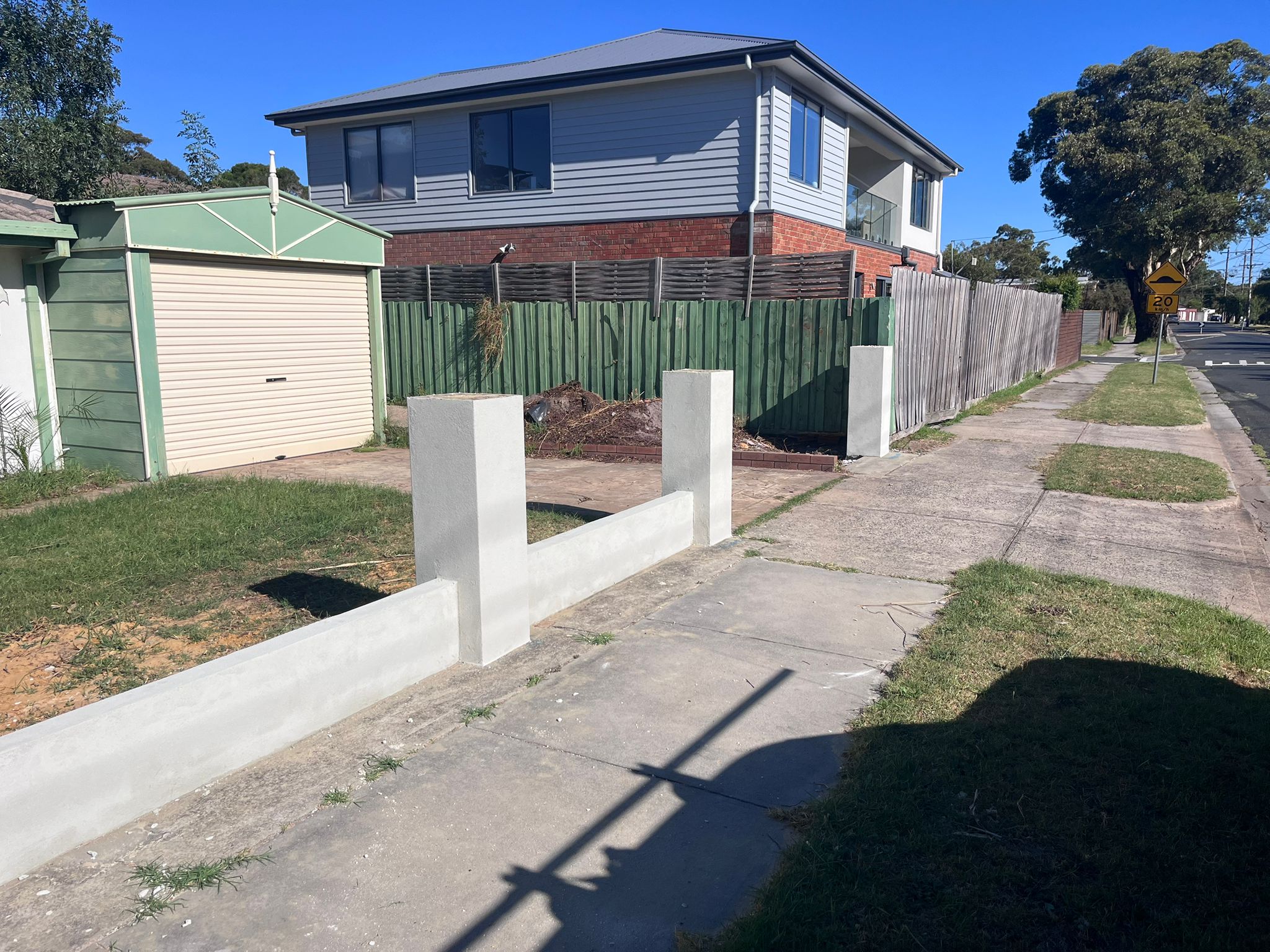 Rendered Front Fence & Pillars Newly rendered low front fence and pillars add a clean, modern touch to this suburban property. Ready for painting or finishing, ideal for both privacy and visual appeal.