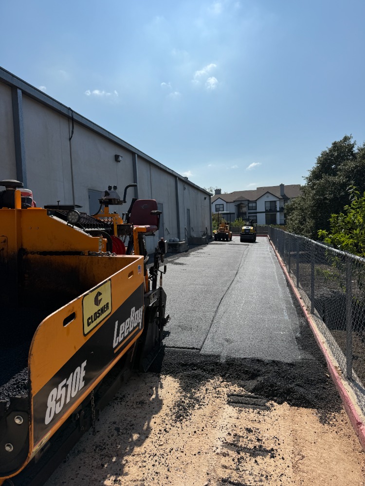 Contractors paving 's image
