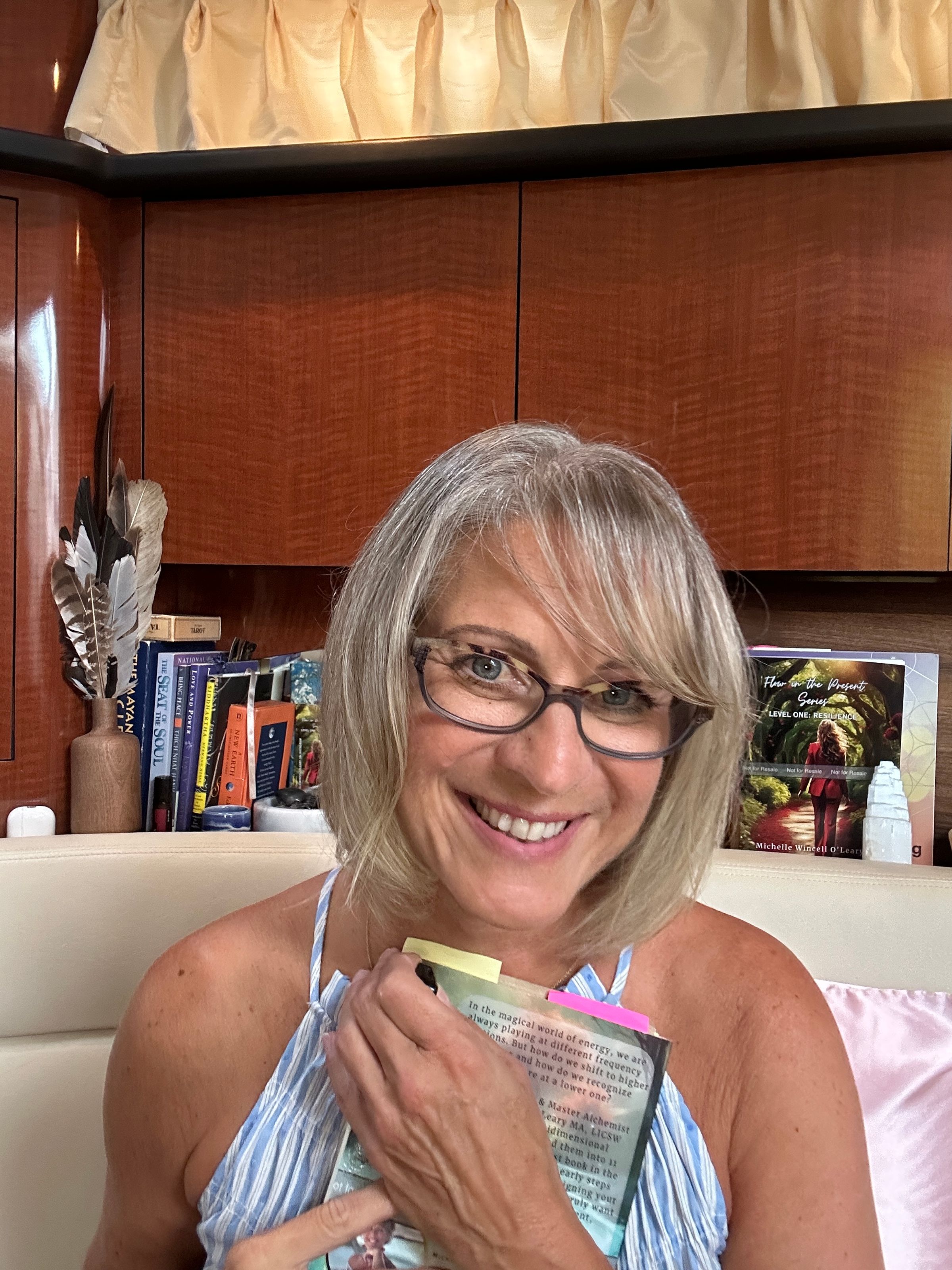 Author holding her book