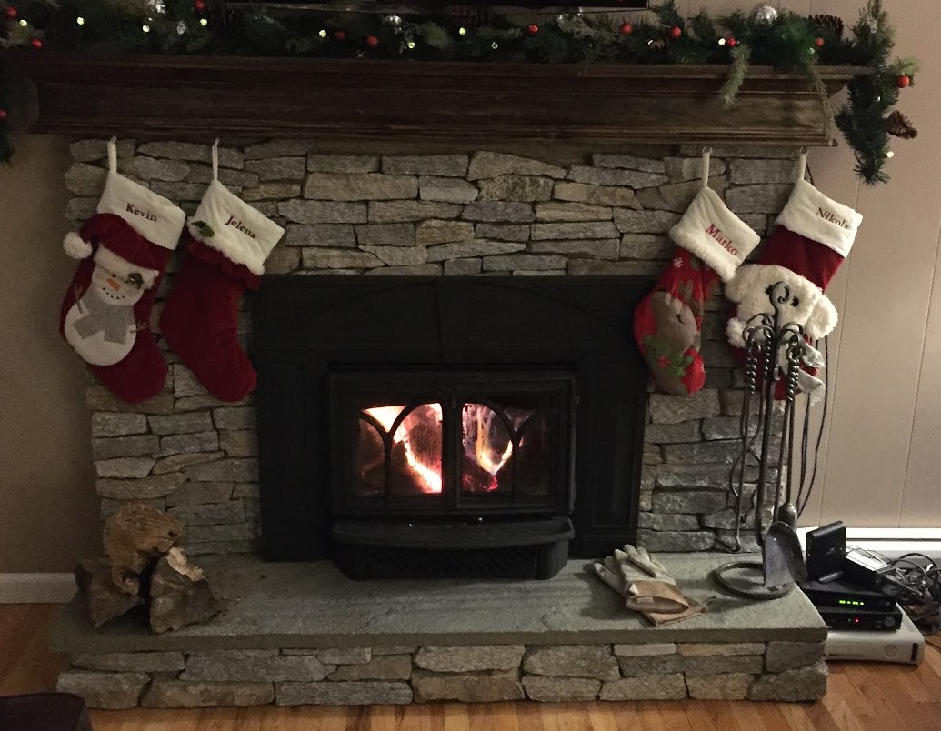 Stacked Stone Veneer Fireplace with WoodStove Insert and Liner