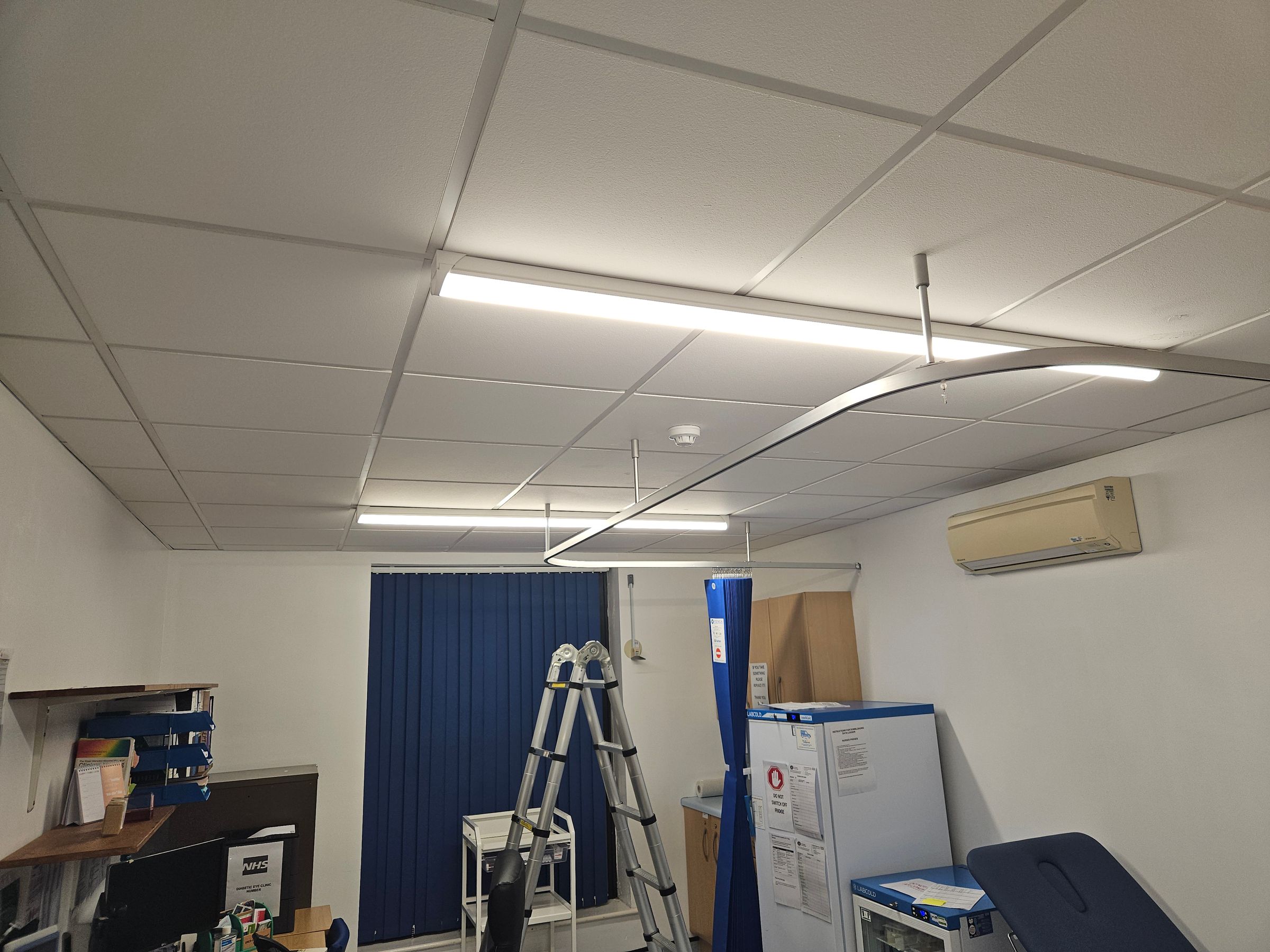 Old florescent lights removed and replaced with new led batten lights