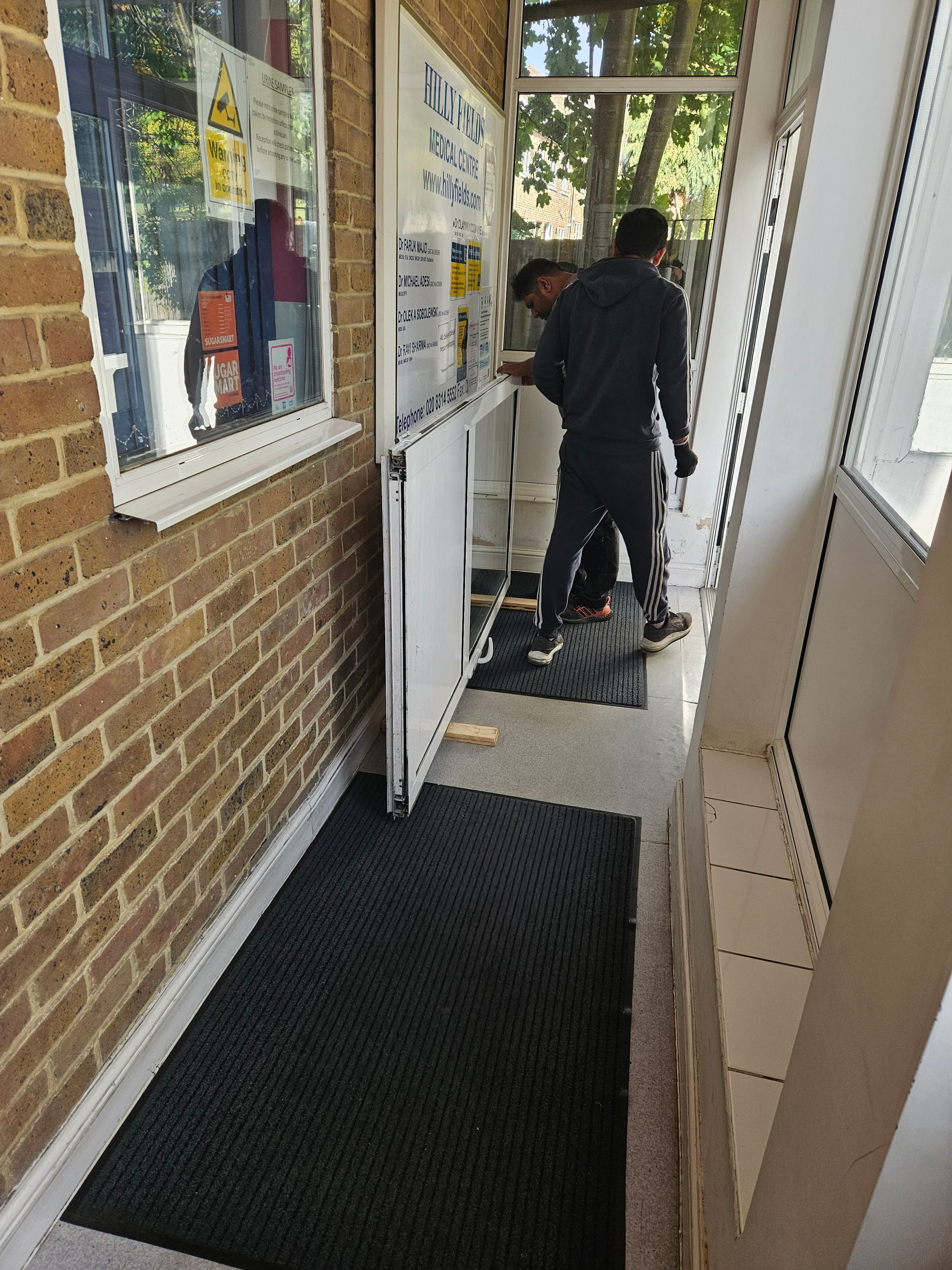 Aluminium door being relined