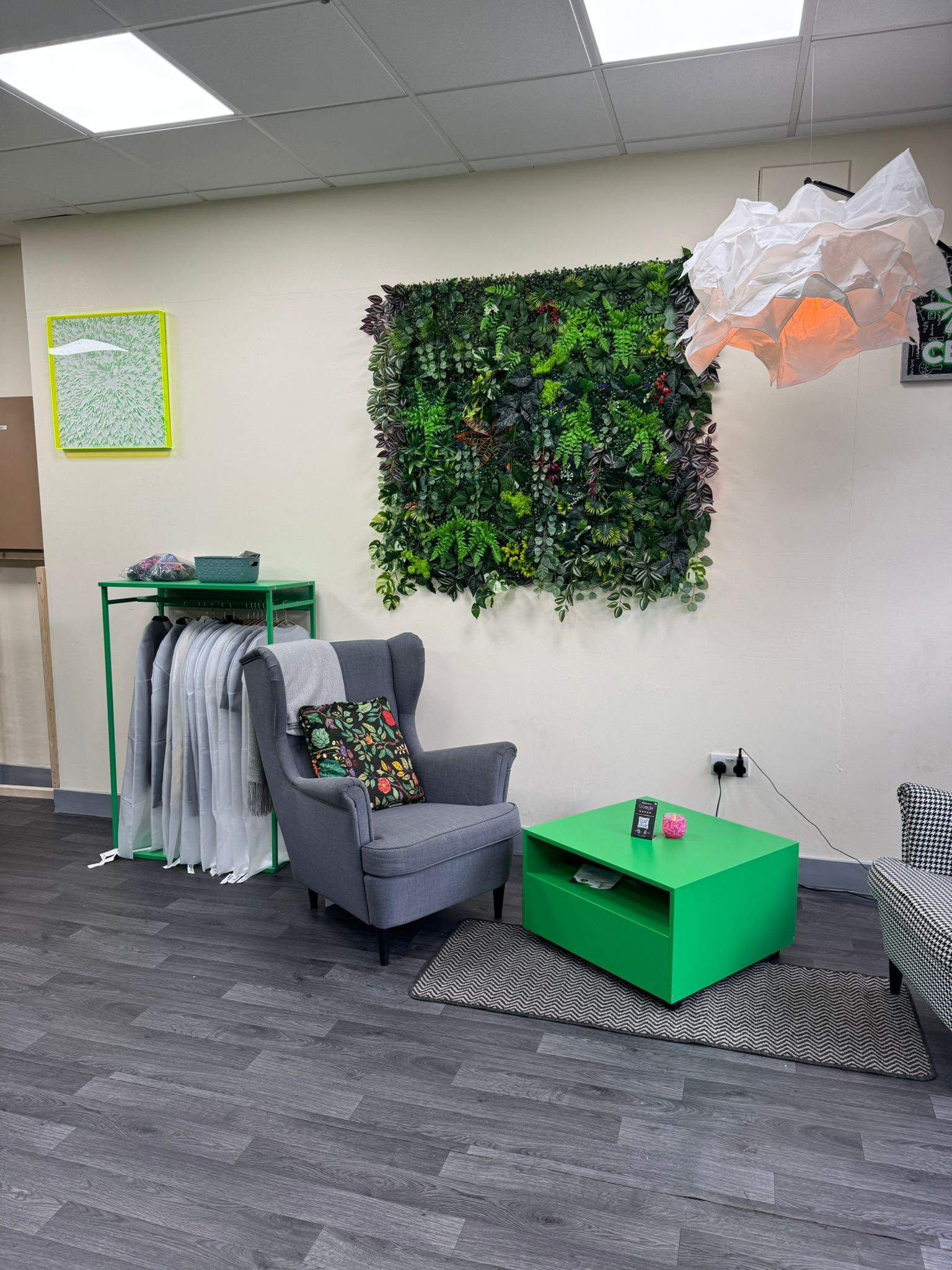 Green Strength Lounge Area and Merchandise Stand 