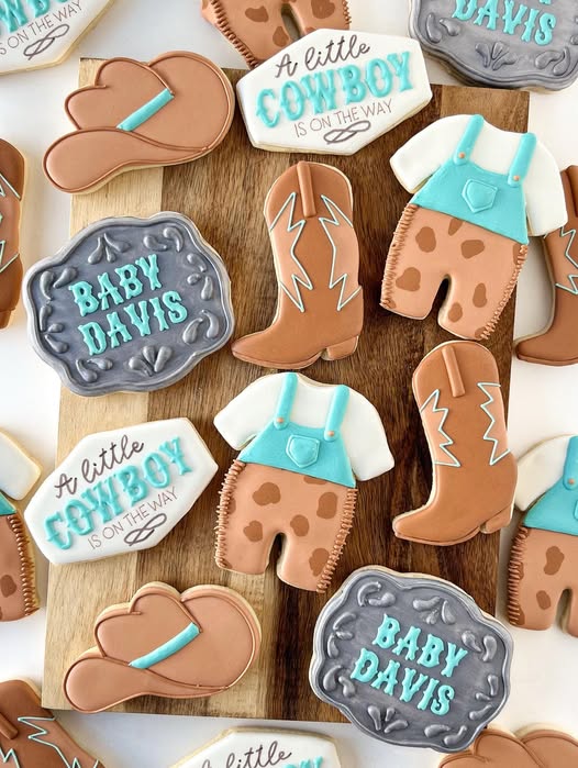 A little cowboy is on the way custom baby shower sugar cookies