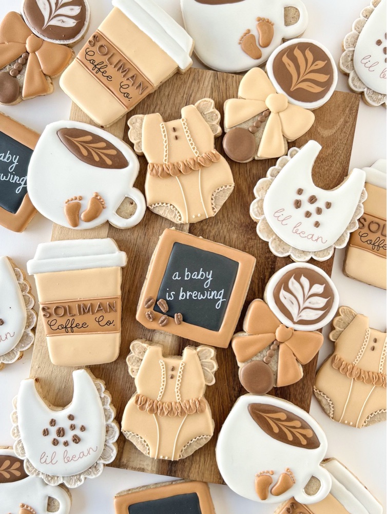 A baby is brewing custom baby shower cookies