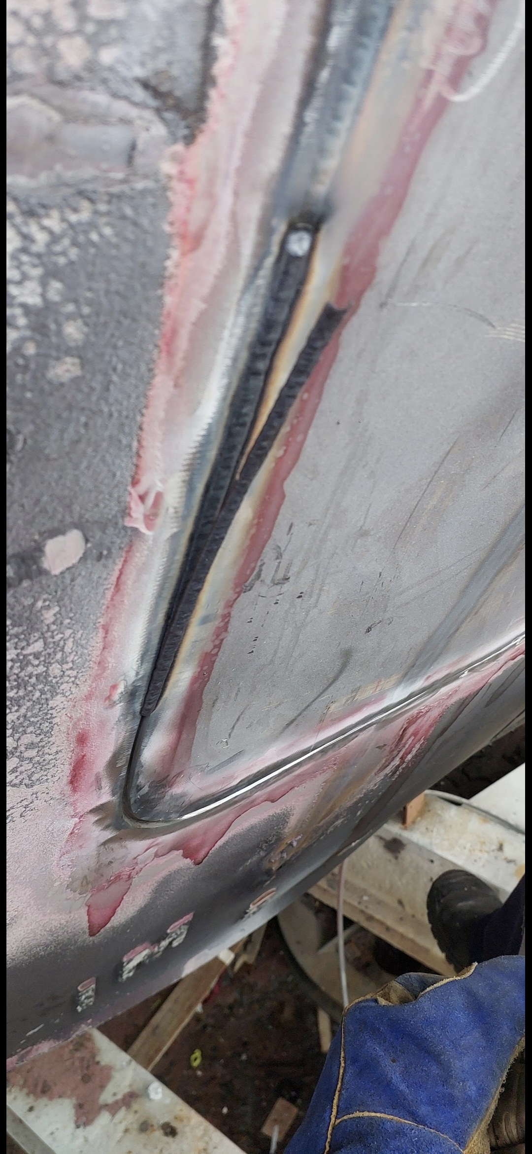 Vertical up stringer FCAWhull plate on ship 