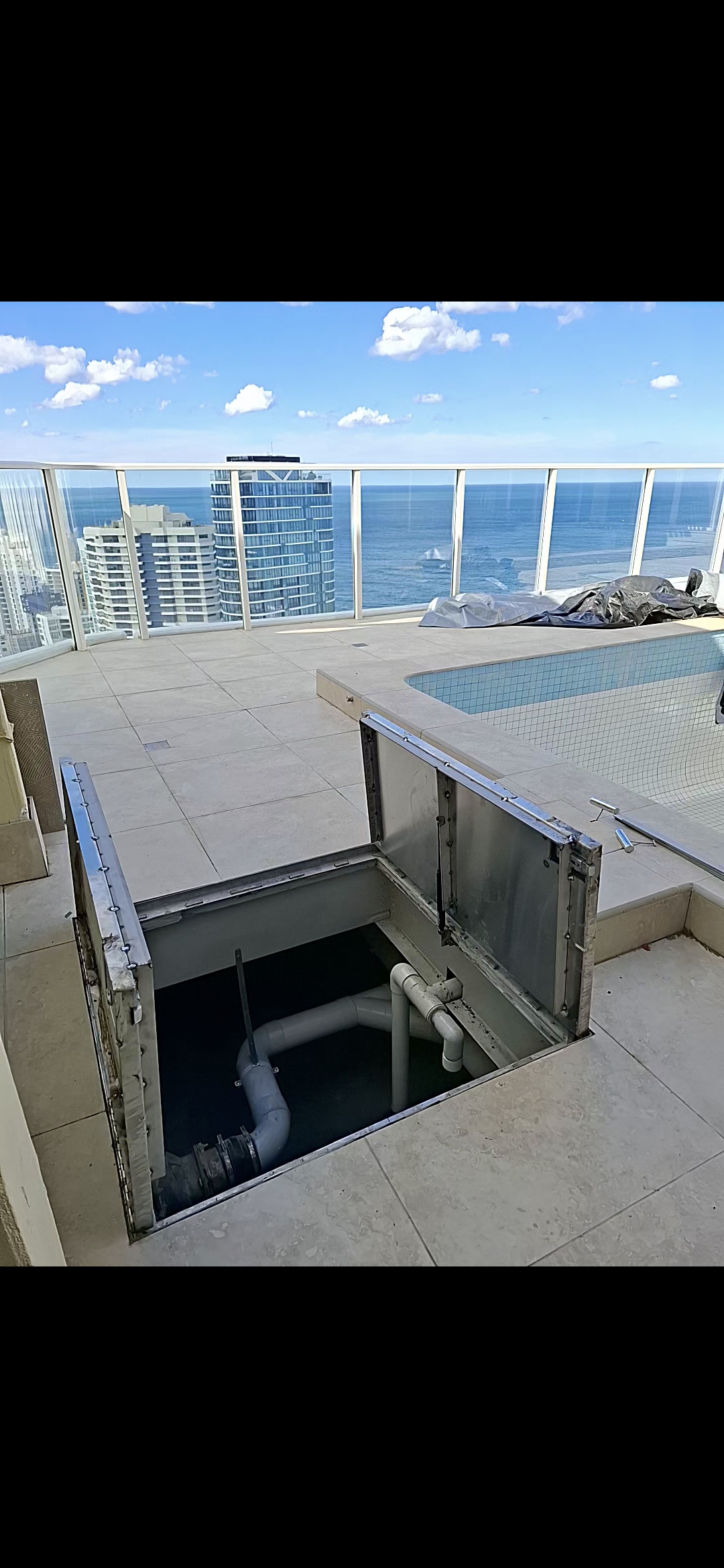 Custom access hatch penthouse pool deck