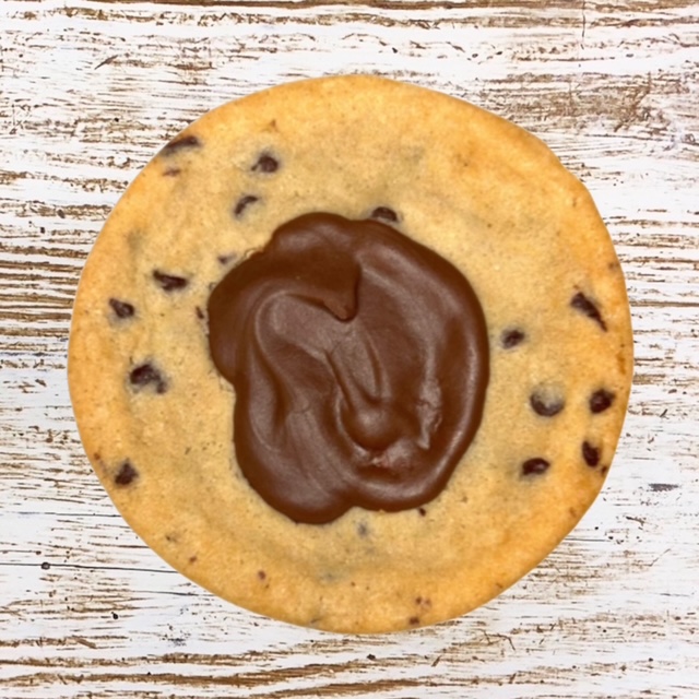 Soft inside and Crunchy outside semi sweet chocolate chip cookie has 3 different chocolates, dark, milk and semi-sweet.