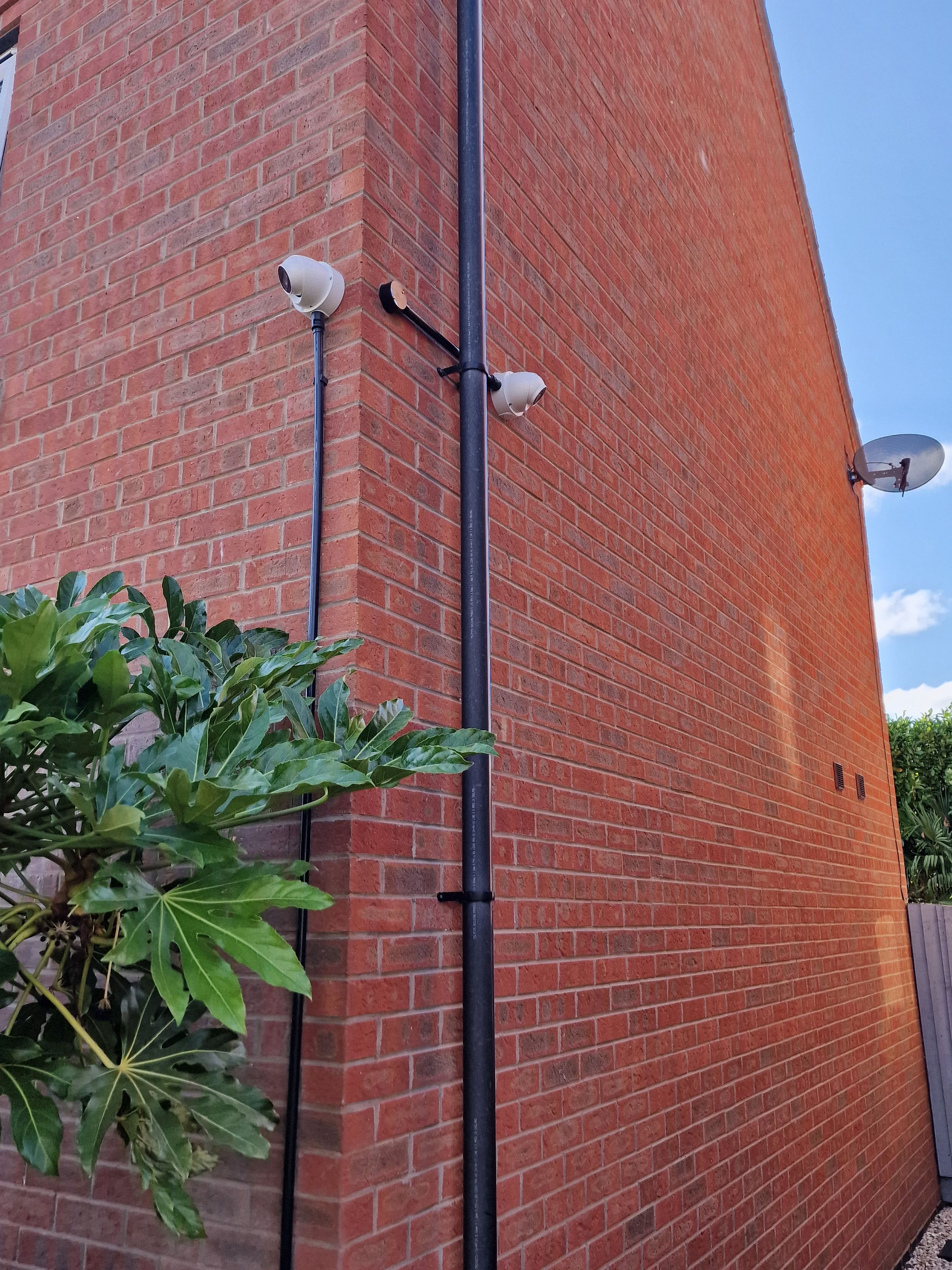 These two cameras were installed at a residential property. The homeowner had experienced a break in, and the cameras have been installed to try and deter future criminals. These particular cameras have alarms on them which trigger when motion is detected at a certain point on their drive.