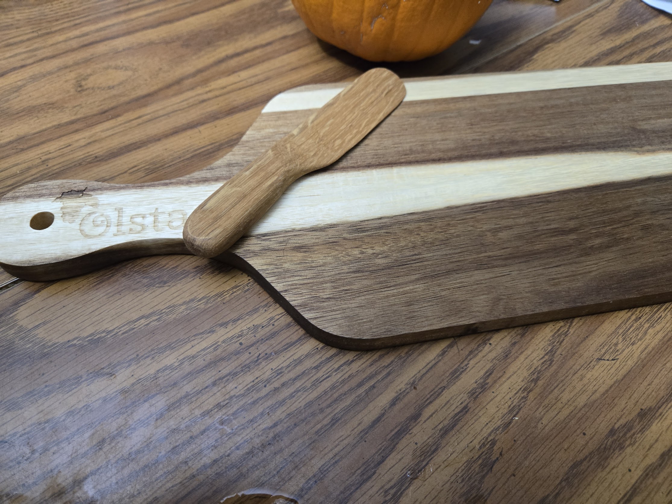 charcuterie board and barrel serving knife