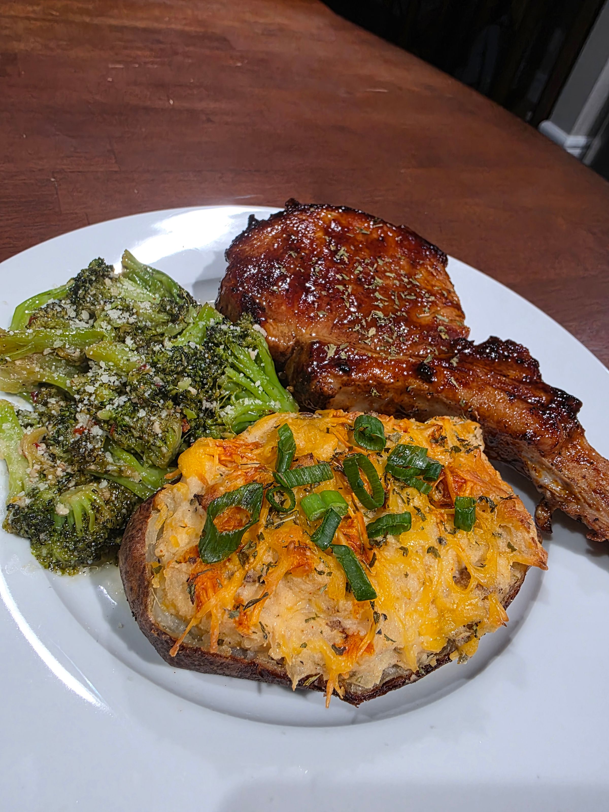 BBQ Pork Chop with Broccoli and a Twice Baked Potato 