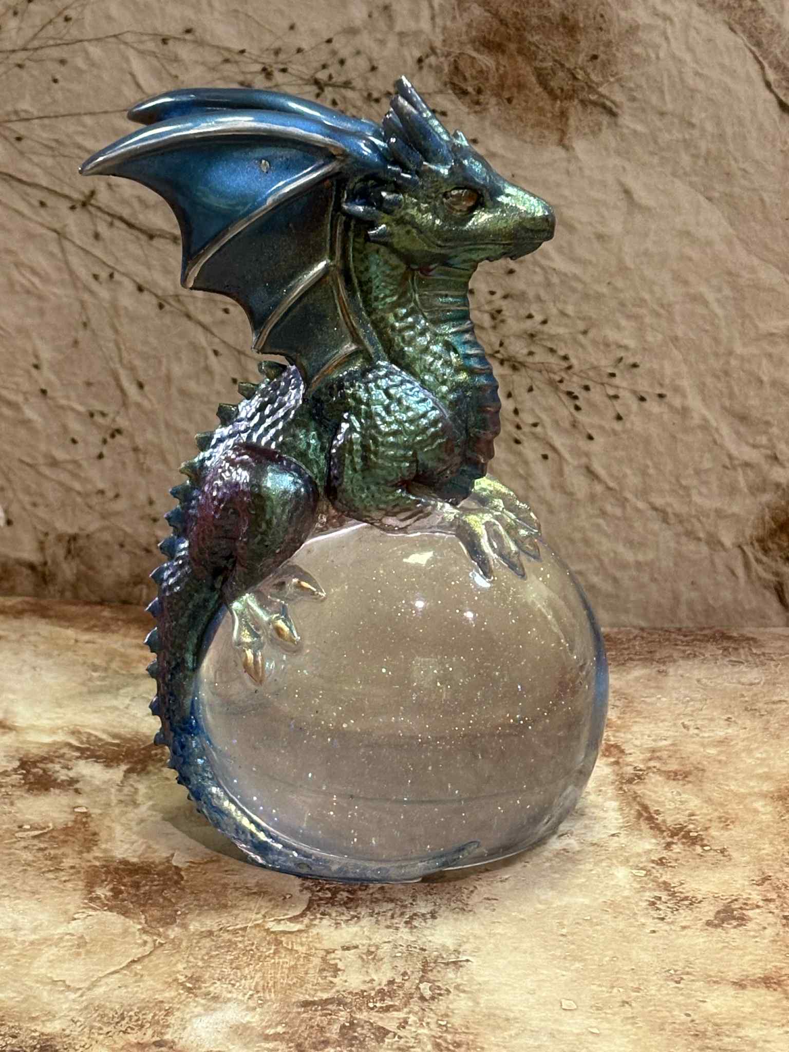 This crystal ball features a mystical design, making it an excellent tool for fortune-telling or a captivating decorative piece. Customizable options are available, starting at $40.00.